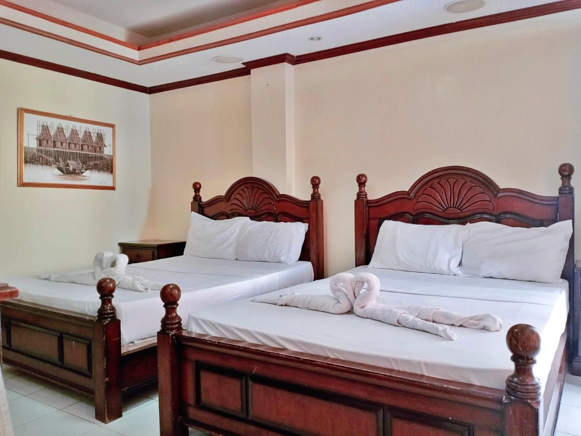 Bed in PALM TREE RESORT AND RESTAURANT