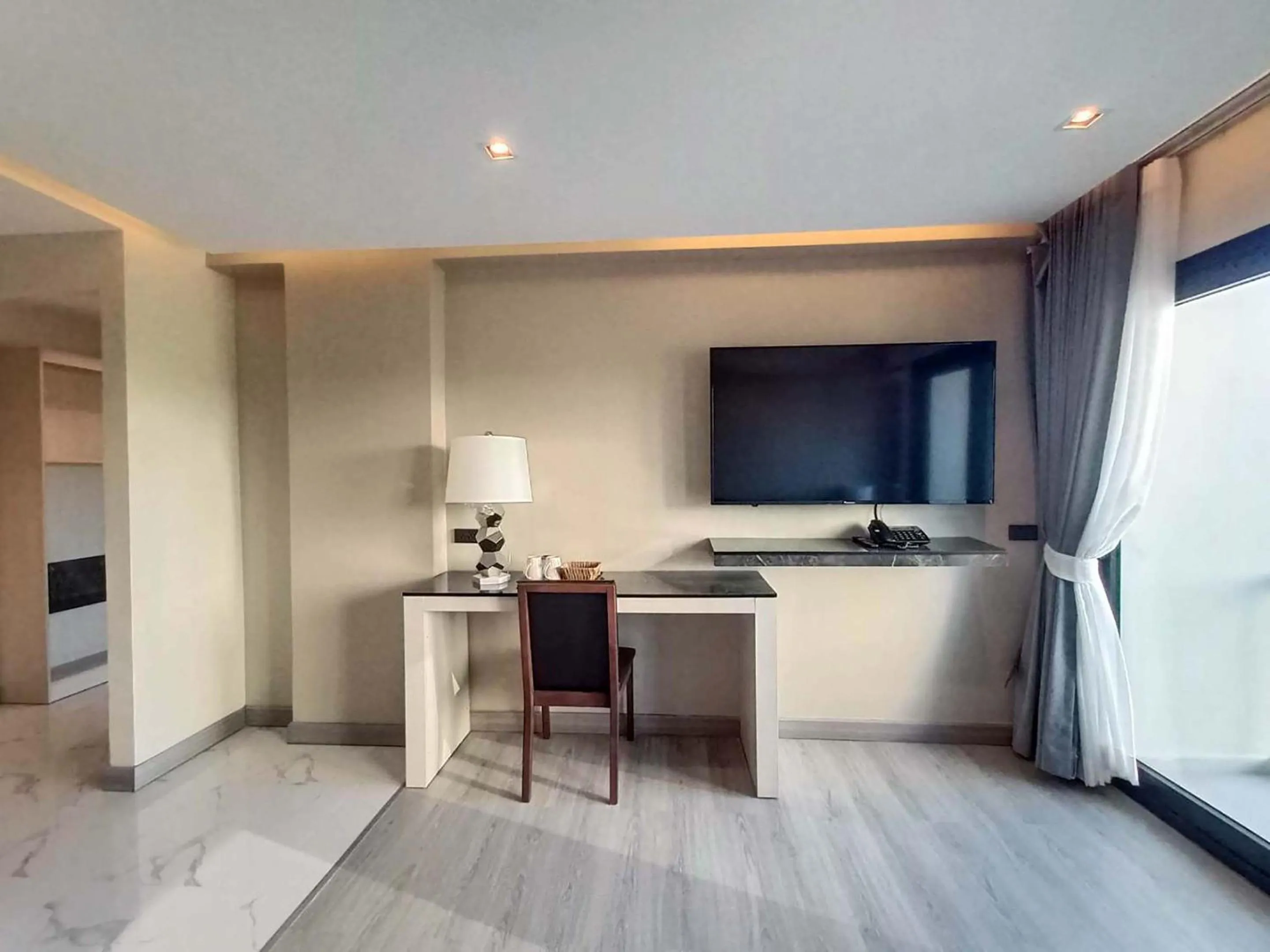 TV and multimedia in The 9 Residence Hotel