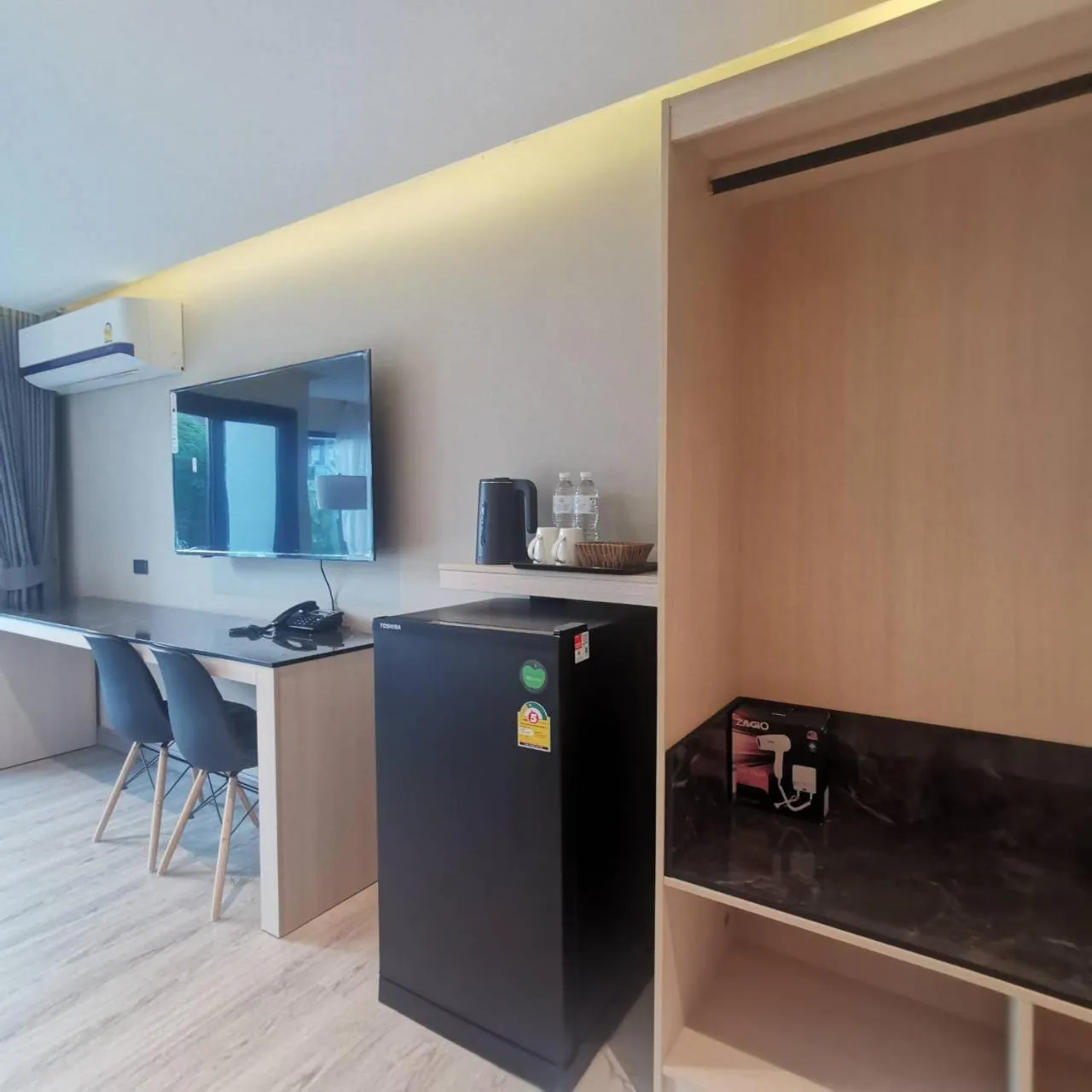 TV and multimedia in The 9 Residence Hotel