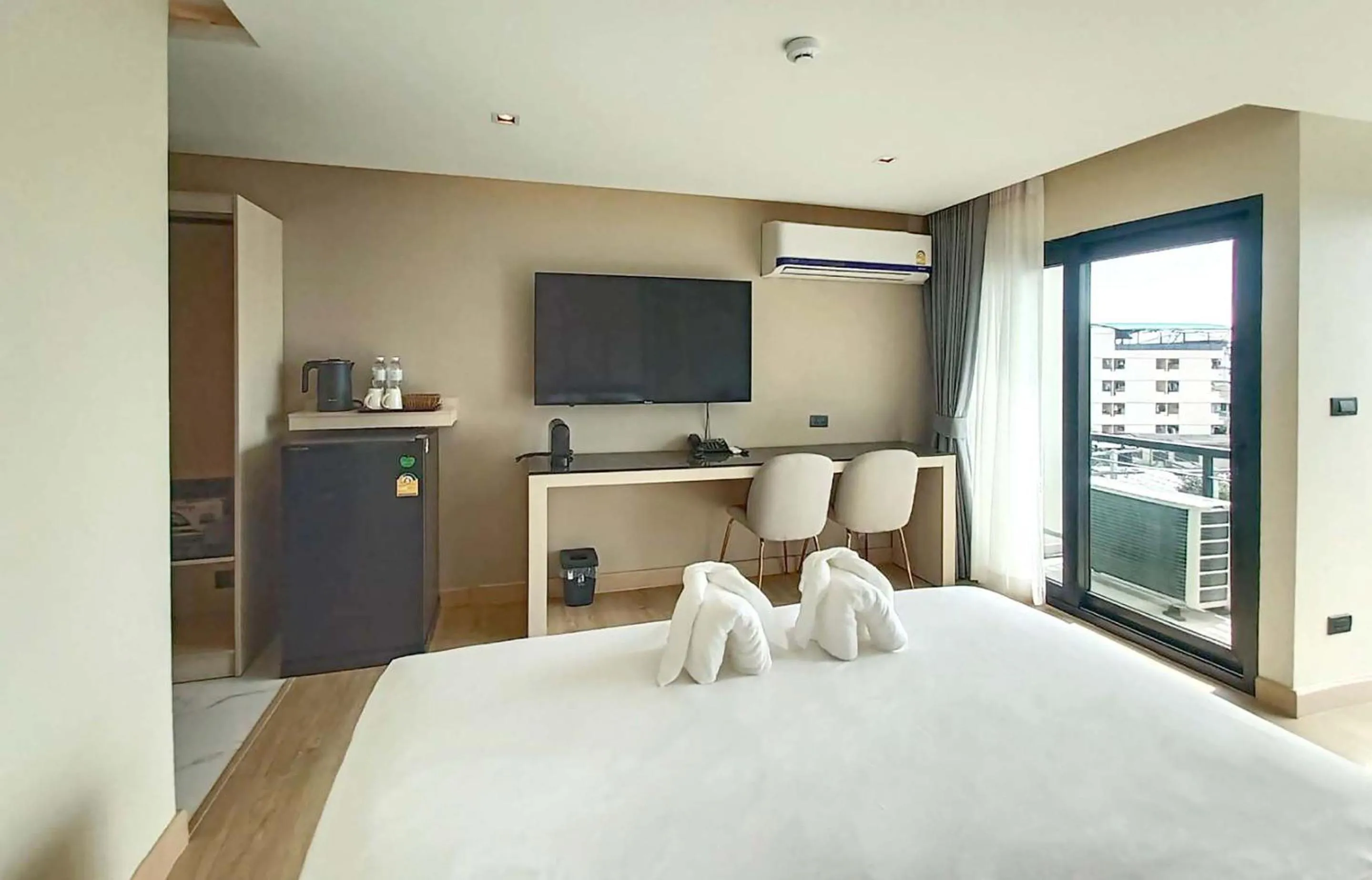 Bed in The 9 Residence Hotel