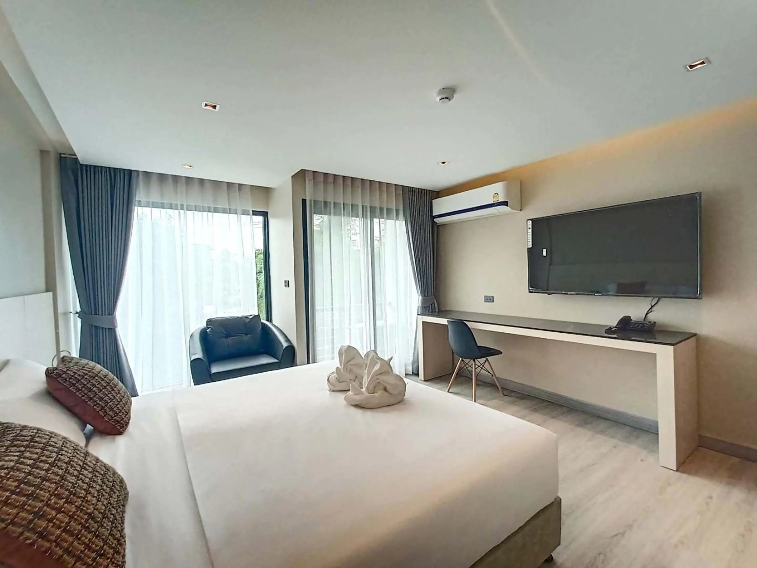 Bed in The 9 Residence Hotel