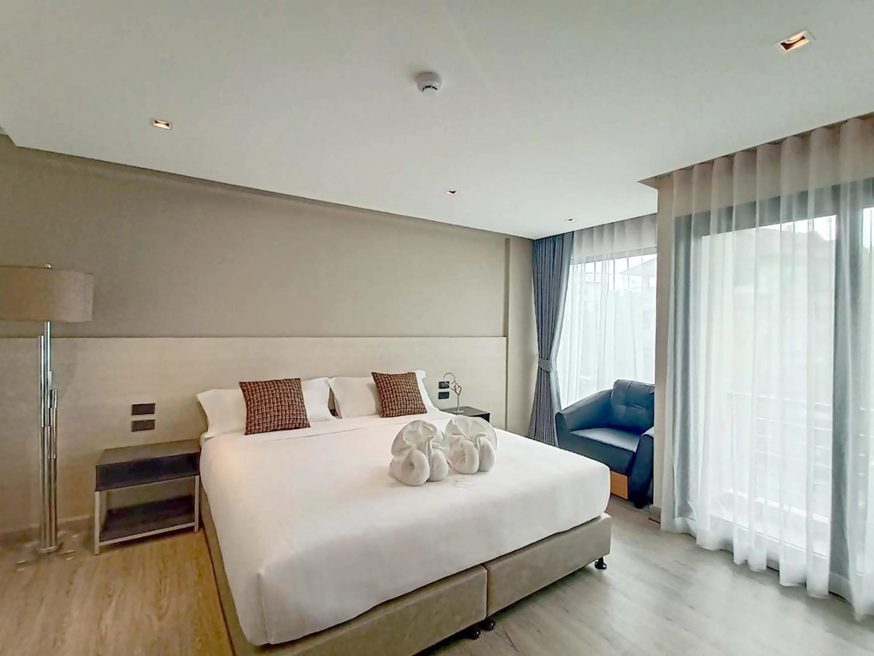 Bed in The 9 Residence Hotel