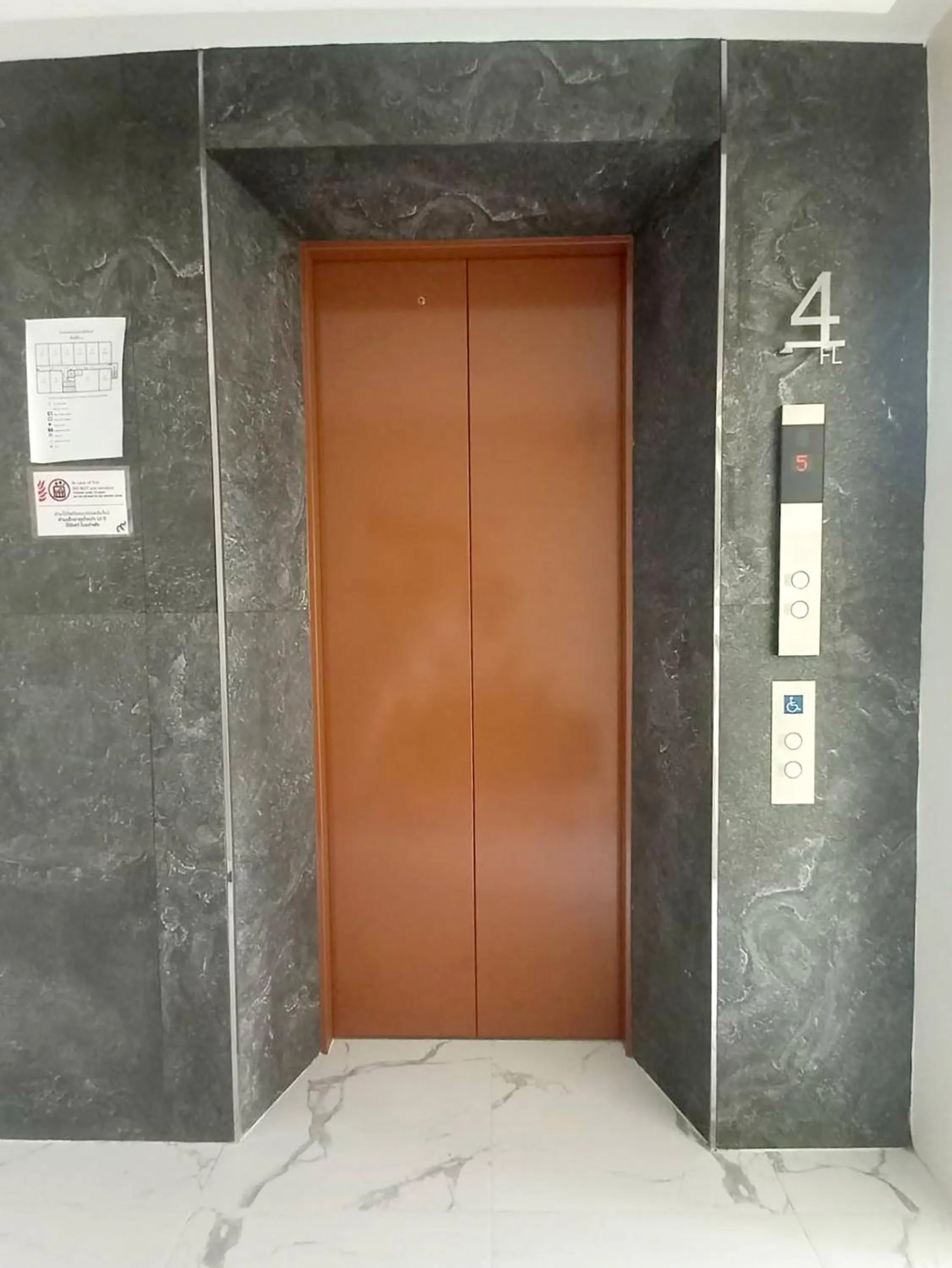 elevator in The 9 Residence Hotel