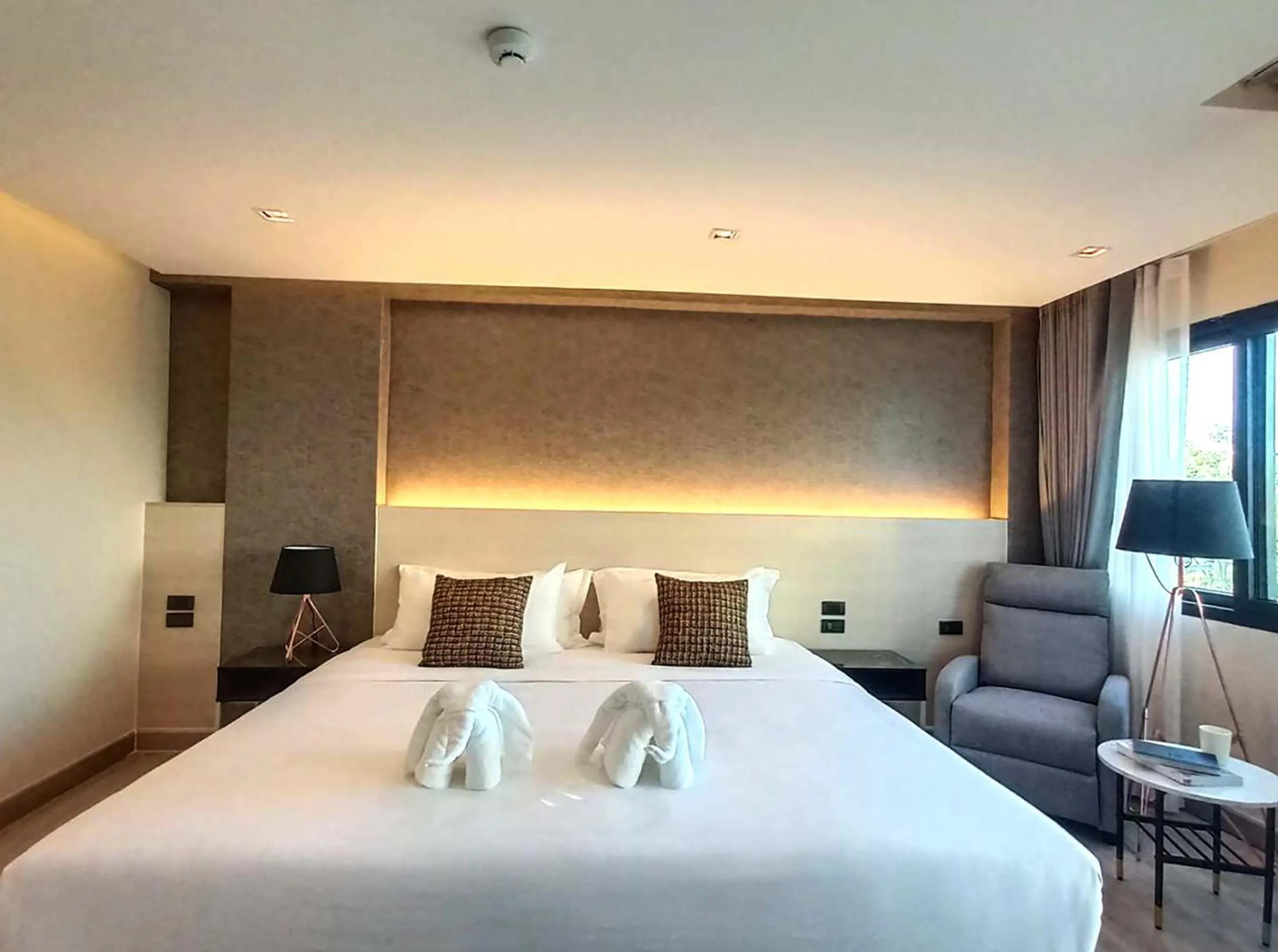 Bed in The 9 Residence Hotel