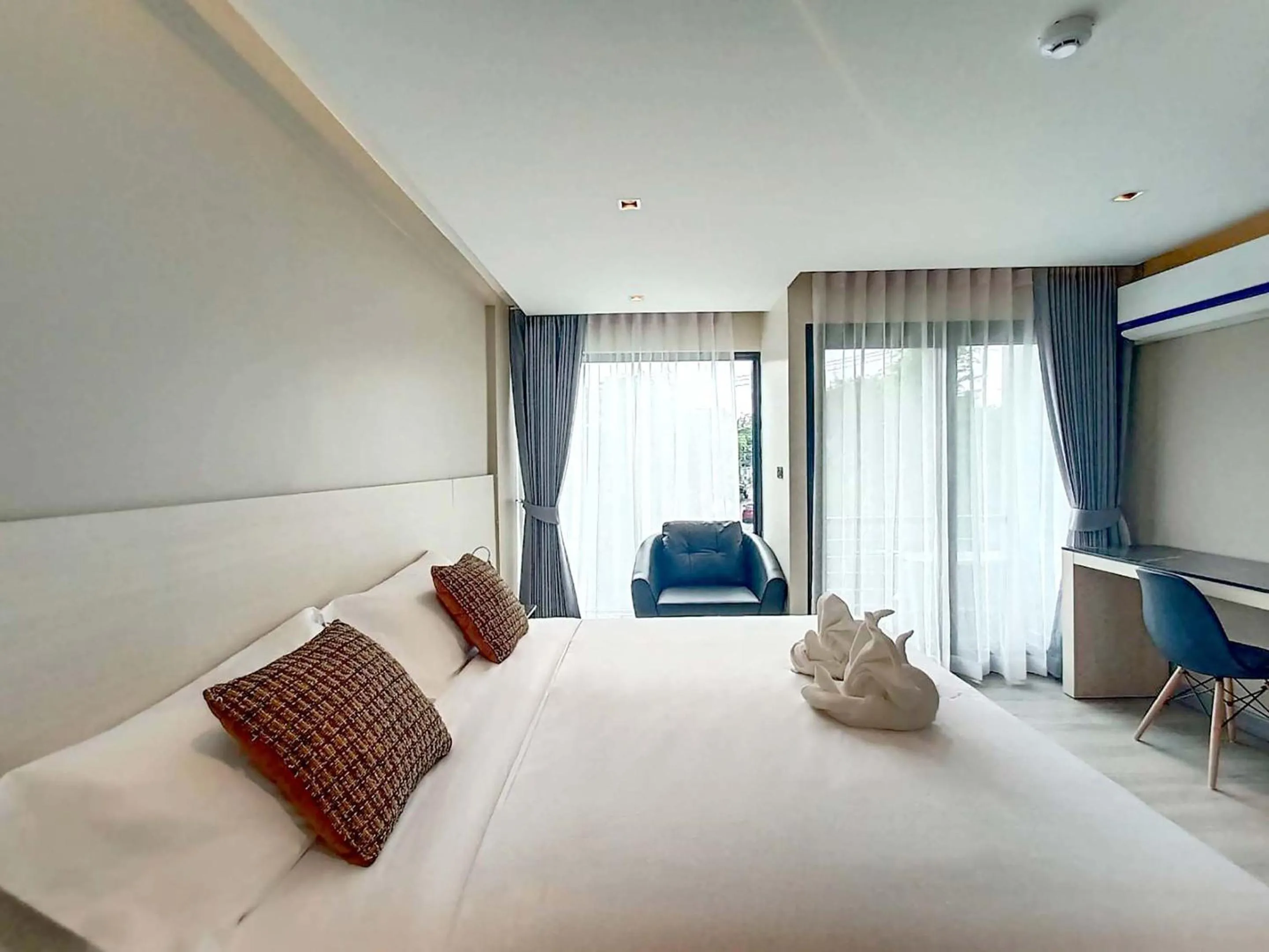 Bed in The 9 Residence Hotel