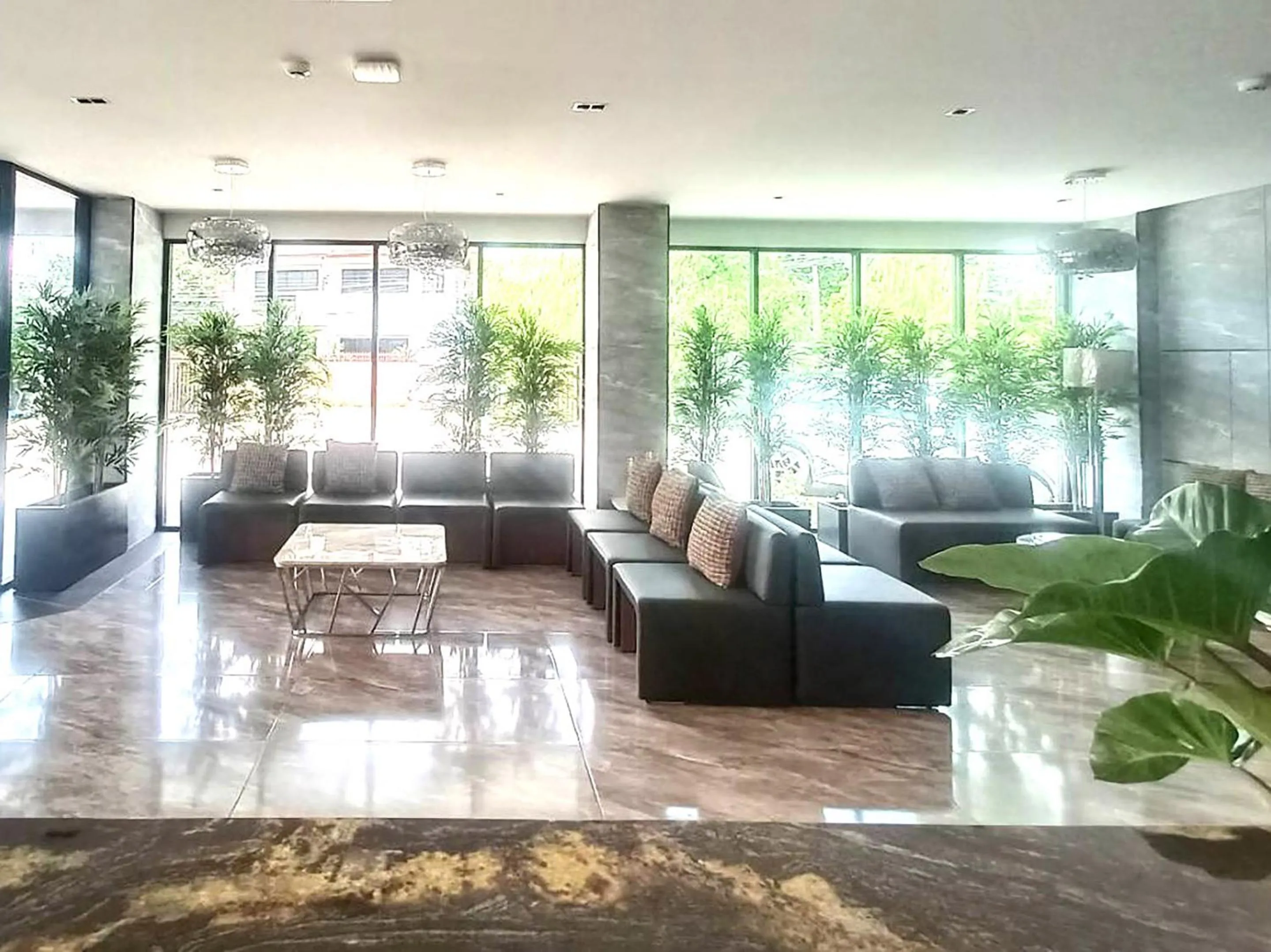 Lobby or reception in The 9 Residence Hotel