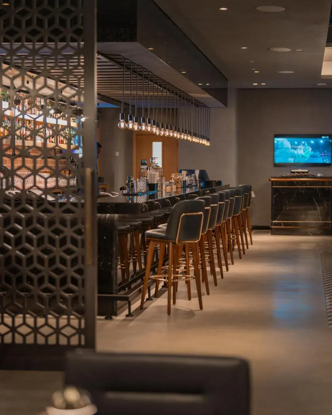 Lounge or bar in Abesq Doha Hotel and Residences, an IHG Hotel Lounge or bar in Abesq Doha Hotel and Residences, an IHG Hotel