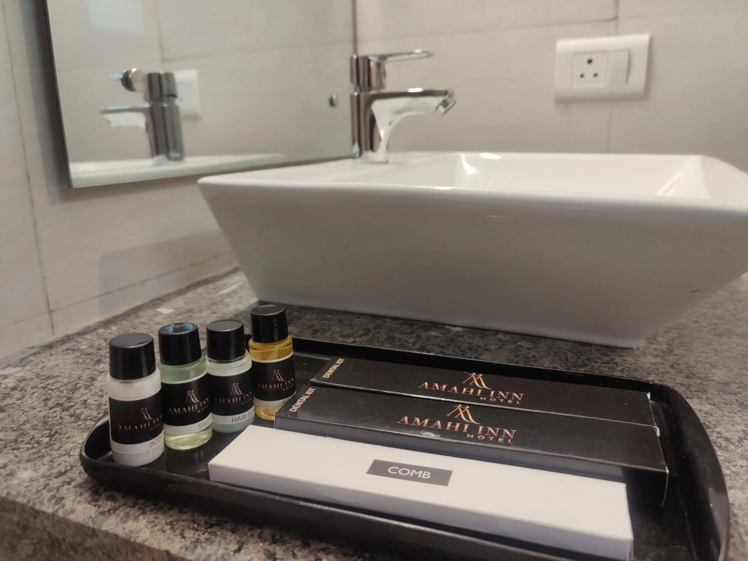 Toilet in Amahi Inn I Signature Towers