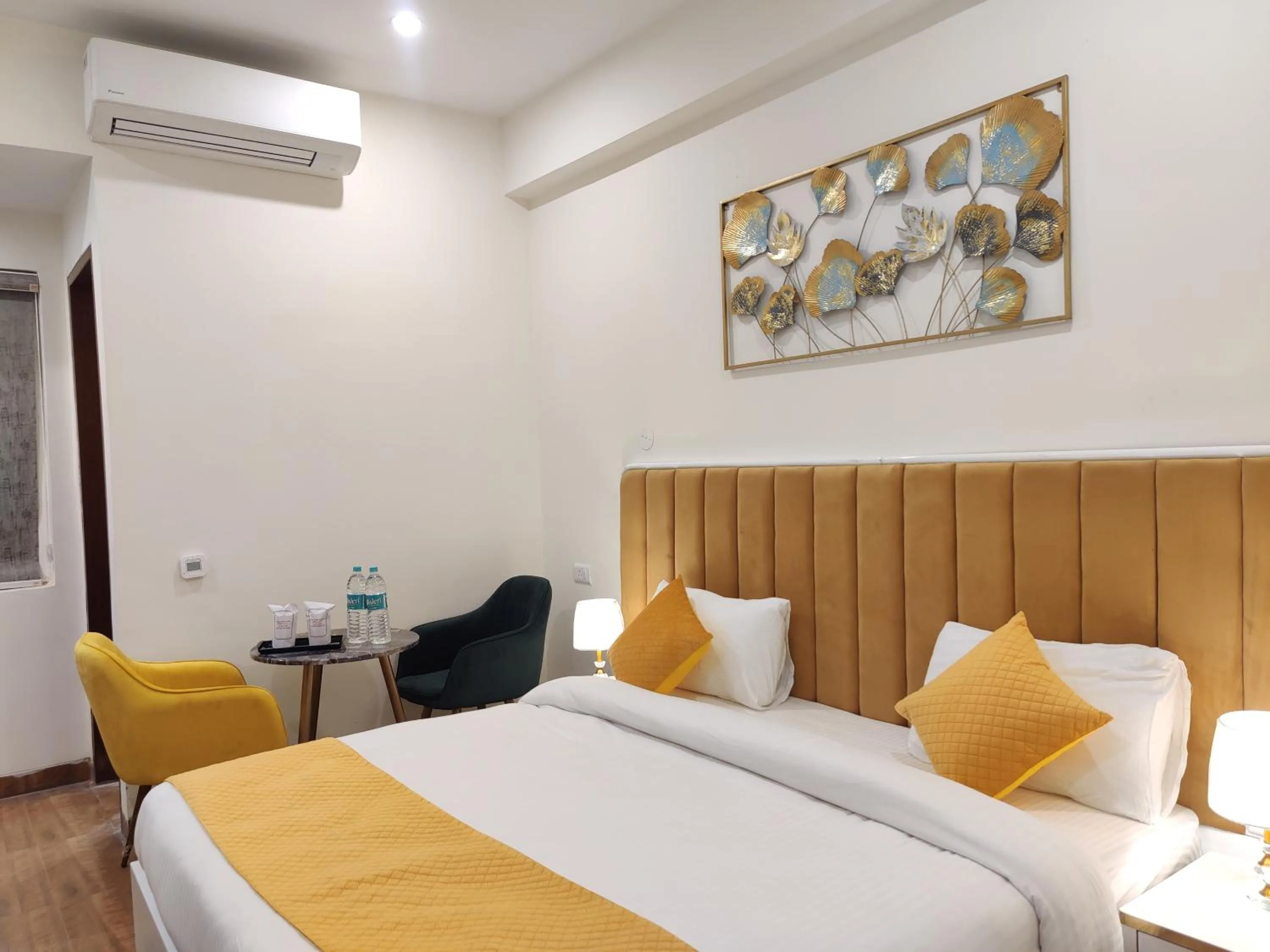 Bed in Amahi Inn I Signature Towers