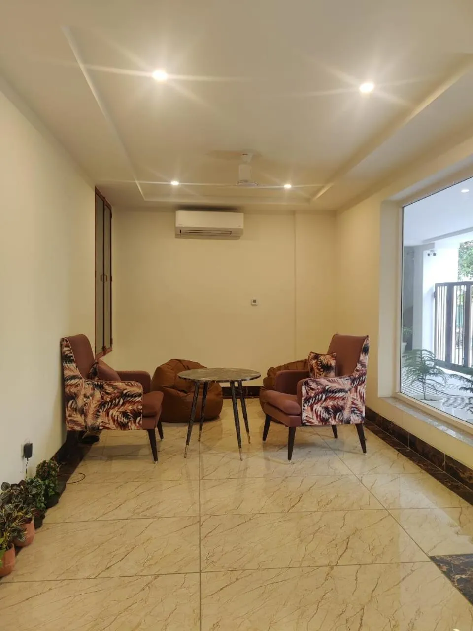 Seating area in Amahi Inn I Signature Towers