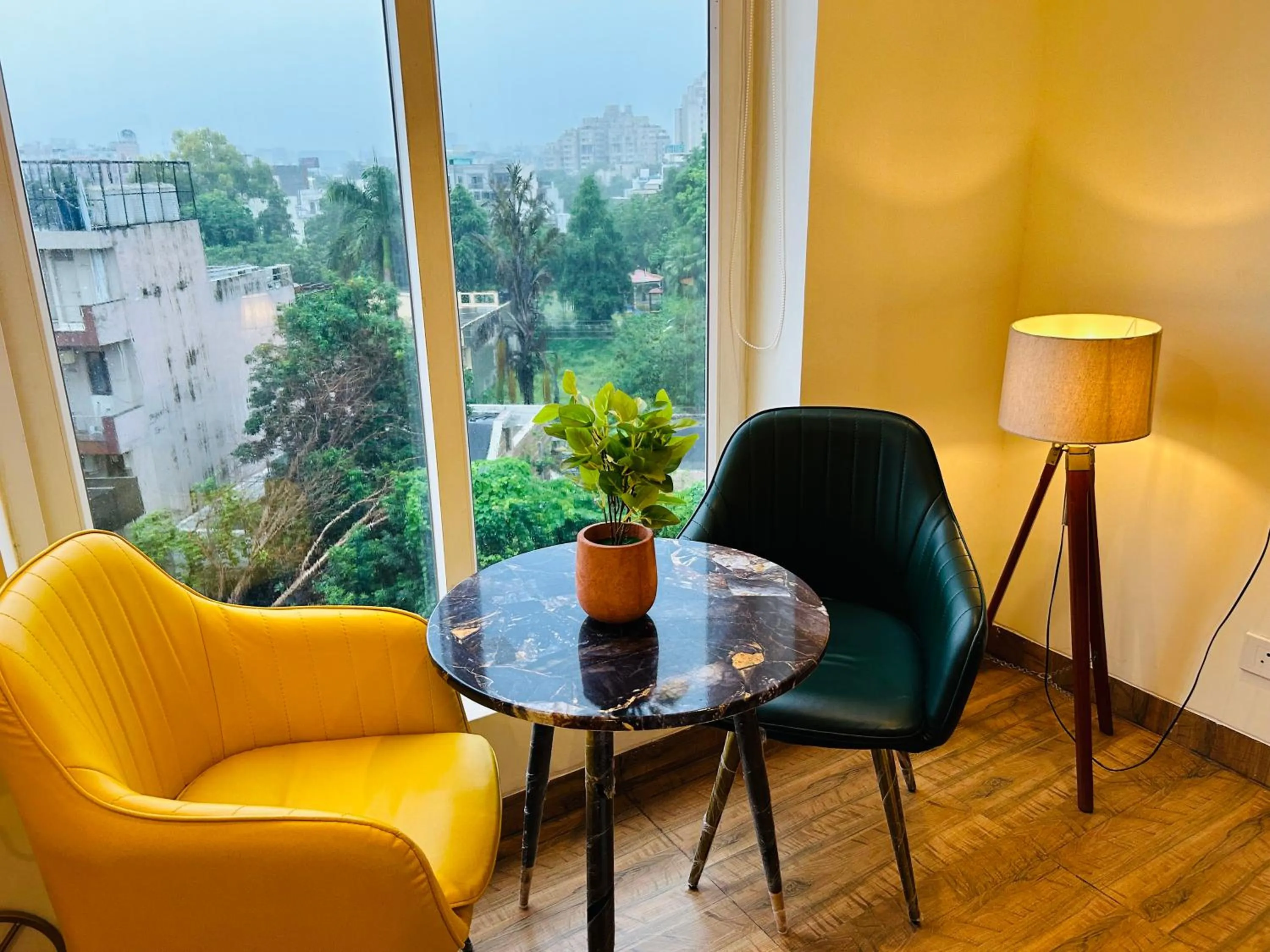 Seating area in Amahi Inn I Signature Towers