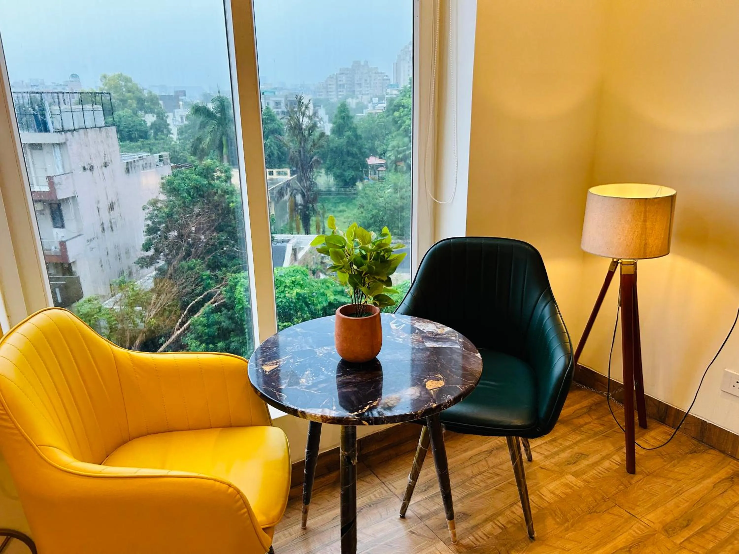 Seating area in Amahi Inn I Signature Towers