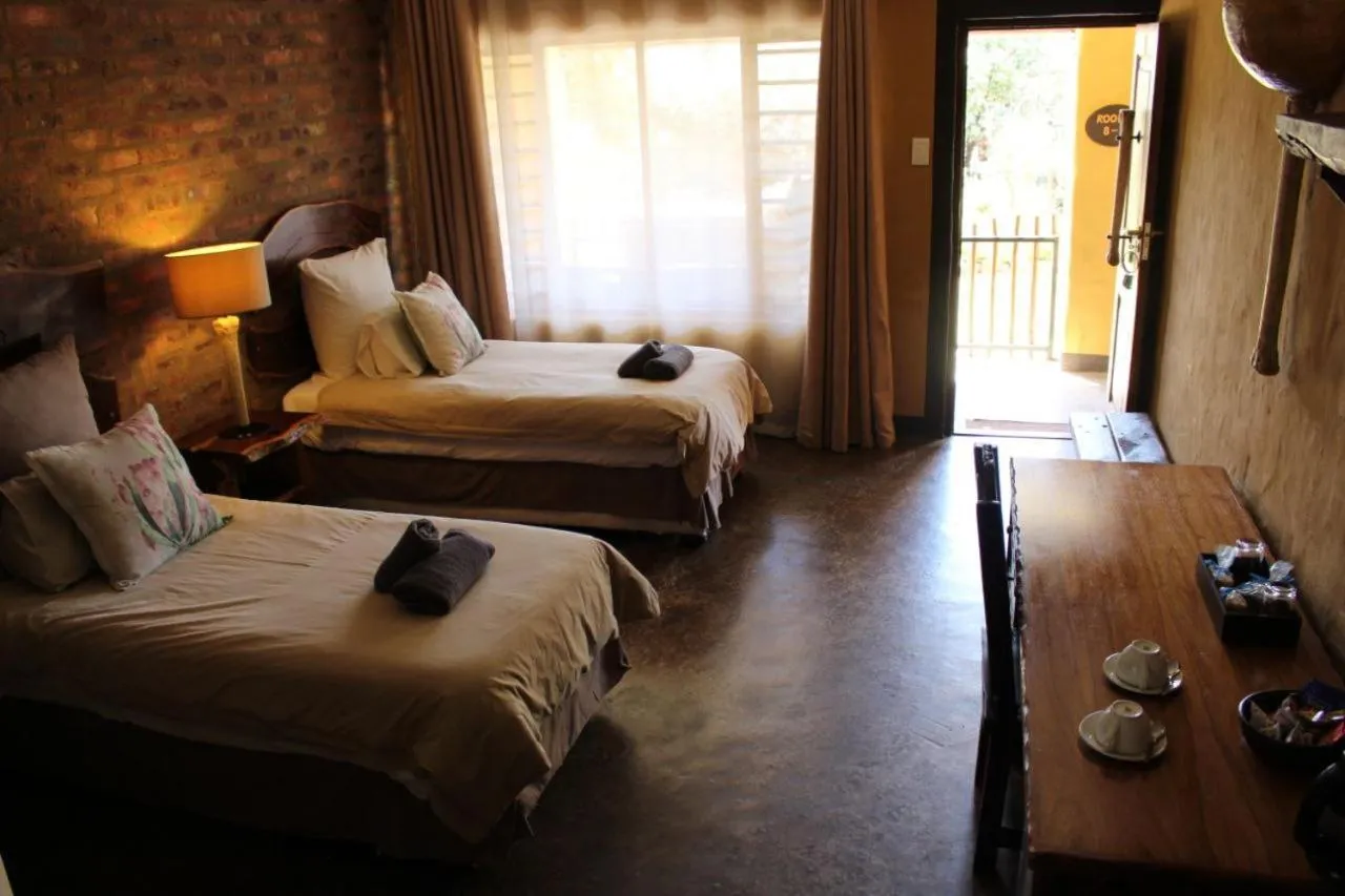 Bedroom, Bed in Ndlovu Lodge