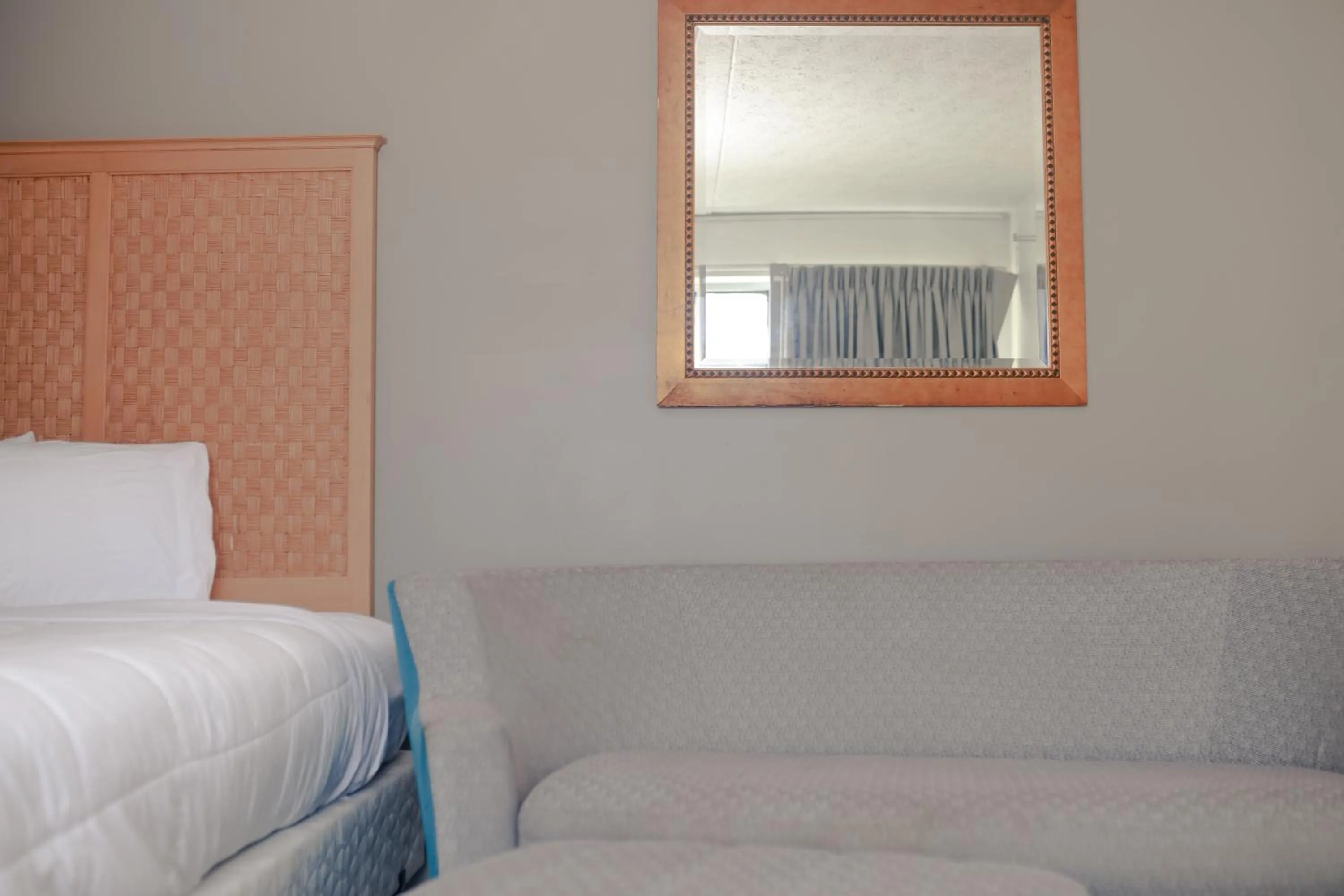 Bed in Southern Breeze Ocean Front Hotel