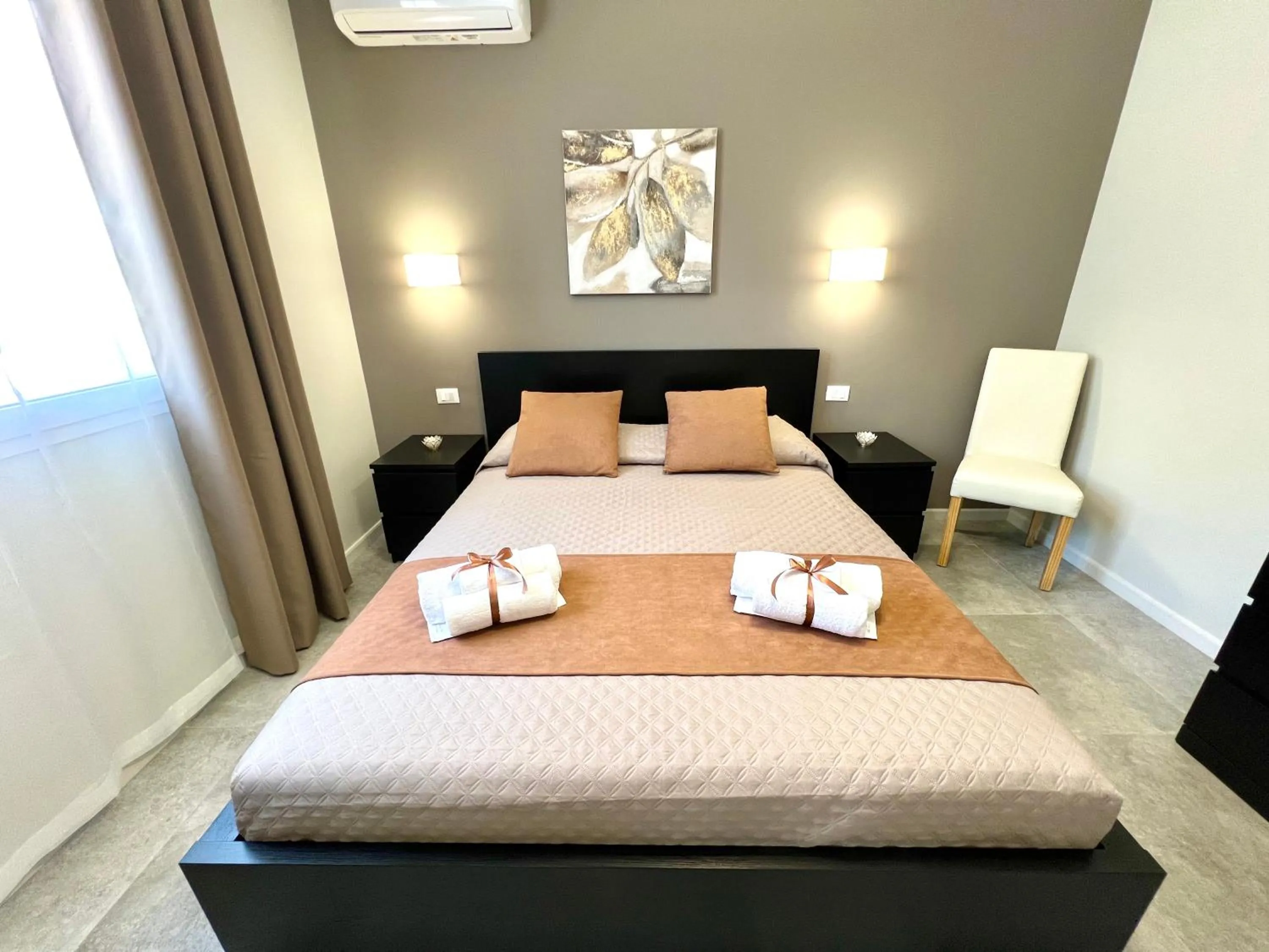 Bed in Piante del Principe Apartments
