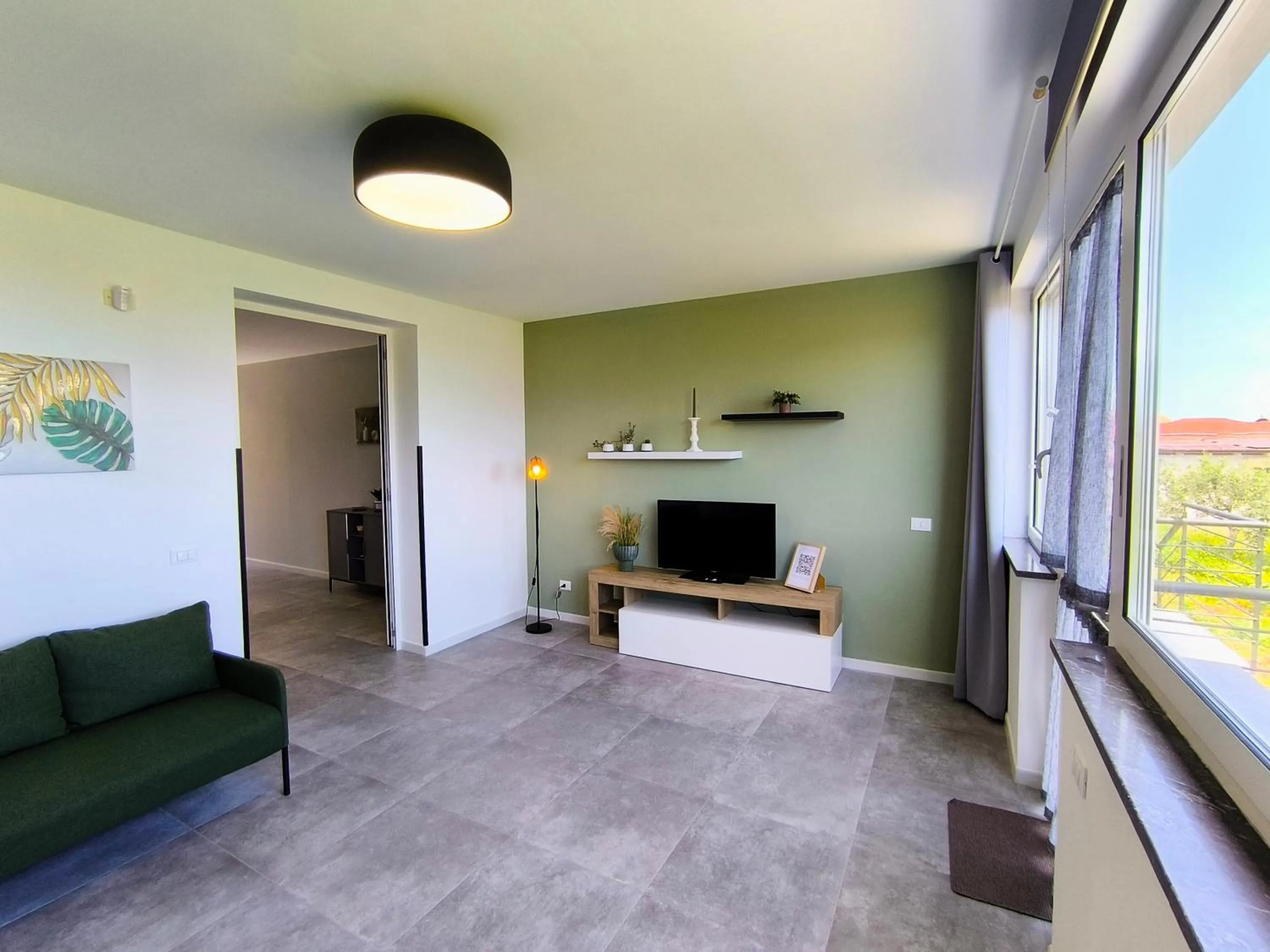 Communal lounge/ TV room in Piante del Principe Apartments