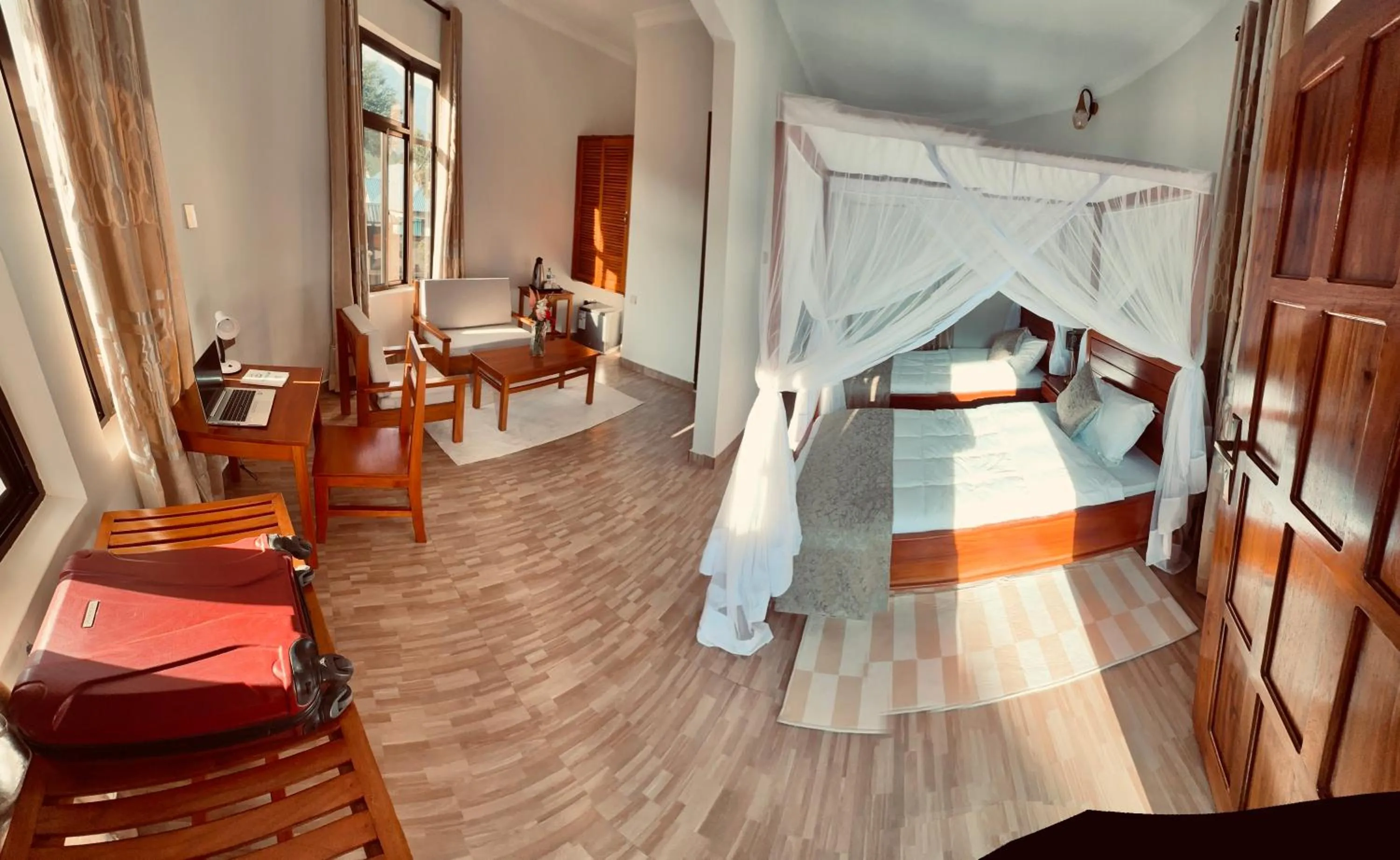 Living room, Bed in Wademac Arusha Inn Hotel