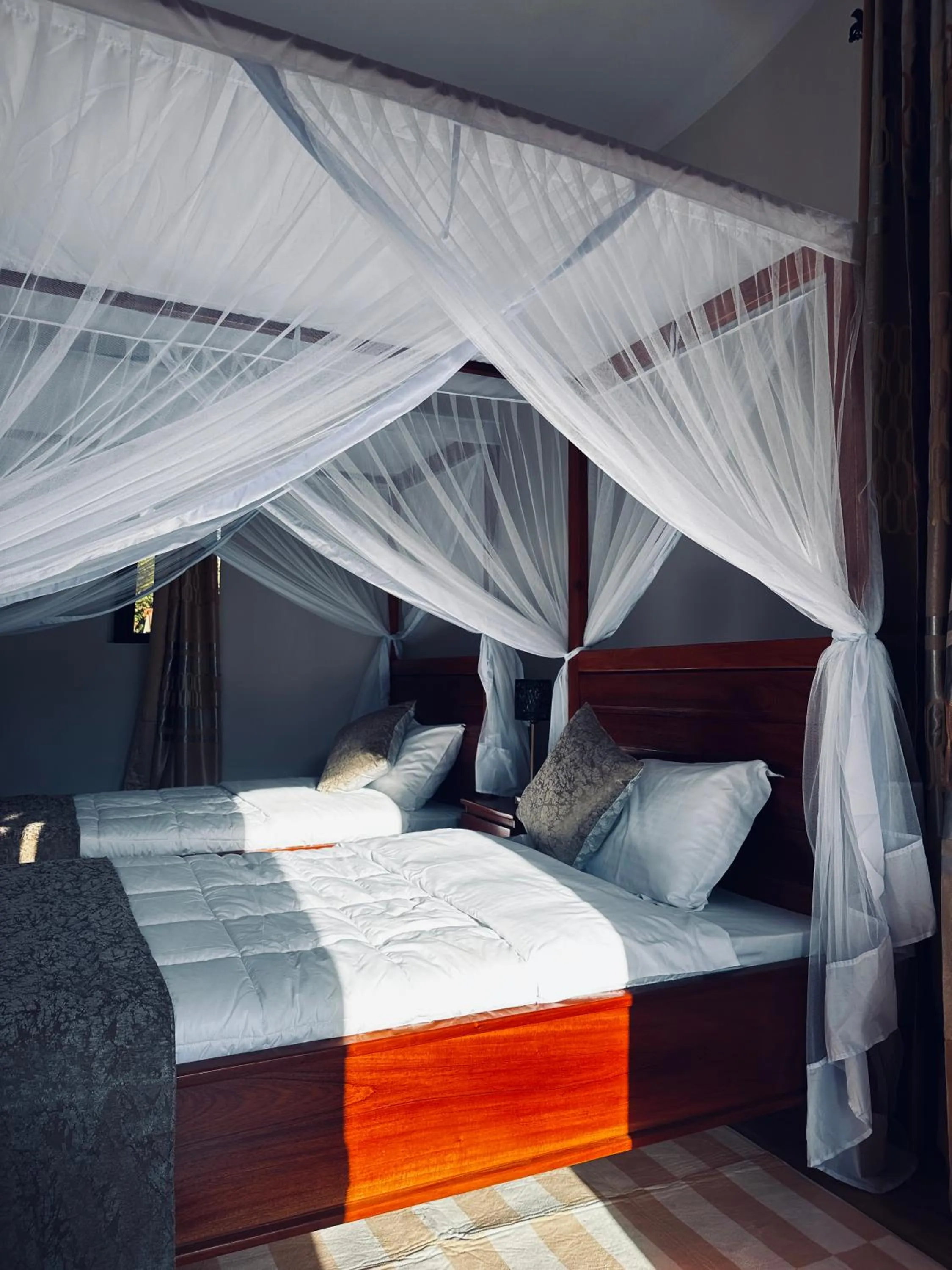 Bedroom, Bed in Wademac Arusha Inn Hotel