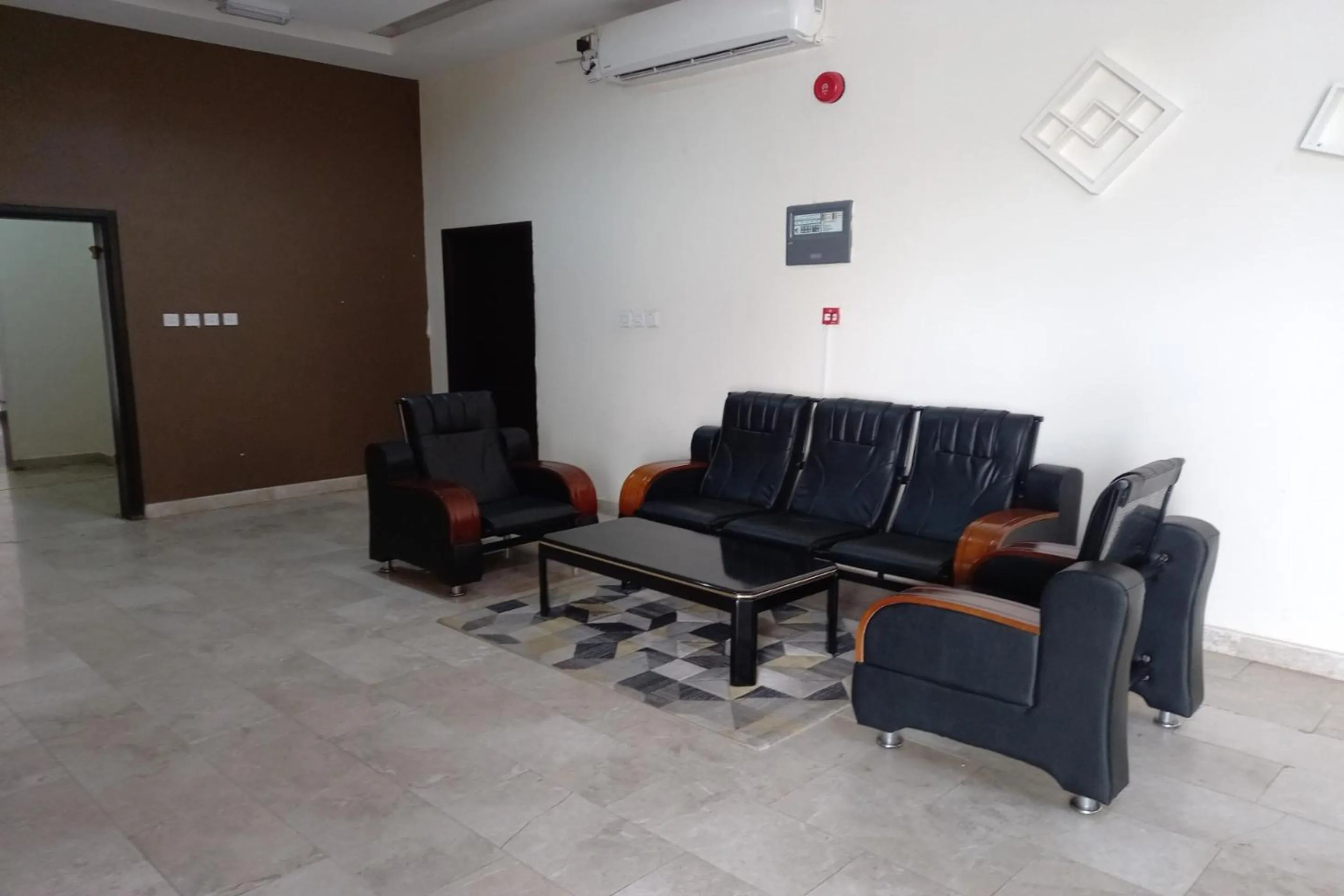 Lobby or reception in Super OYO 147 Babylon Furnished Apartment