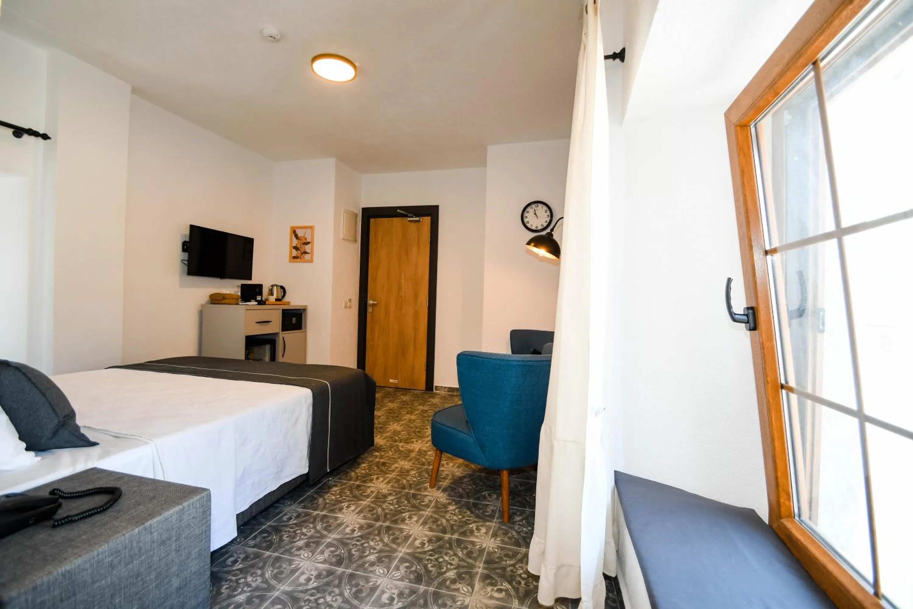 Bed in Swan Boutique Hotel