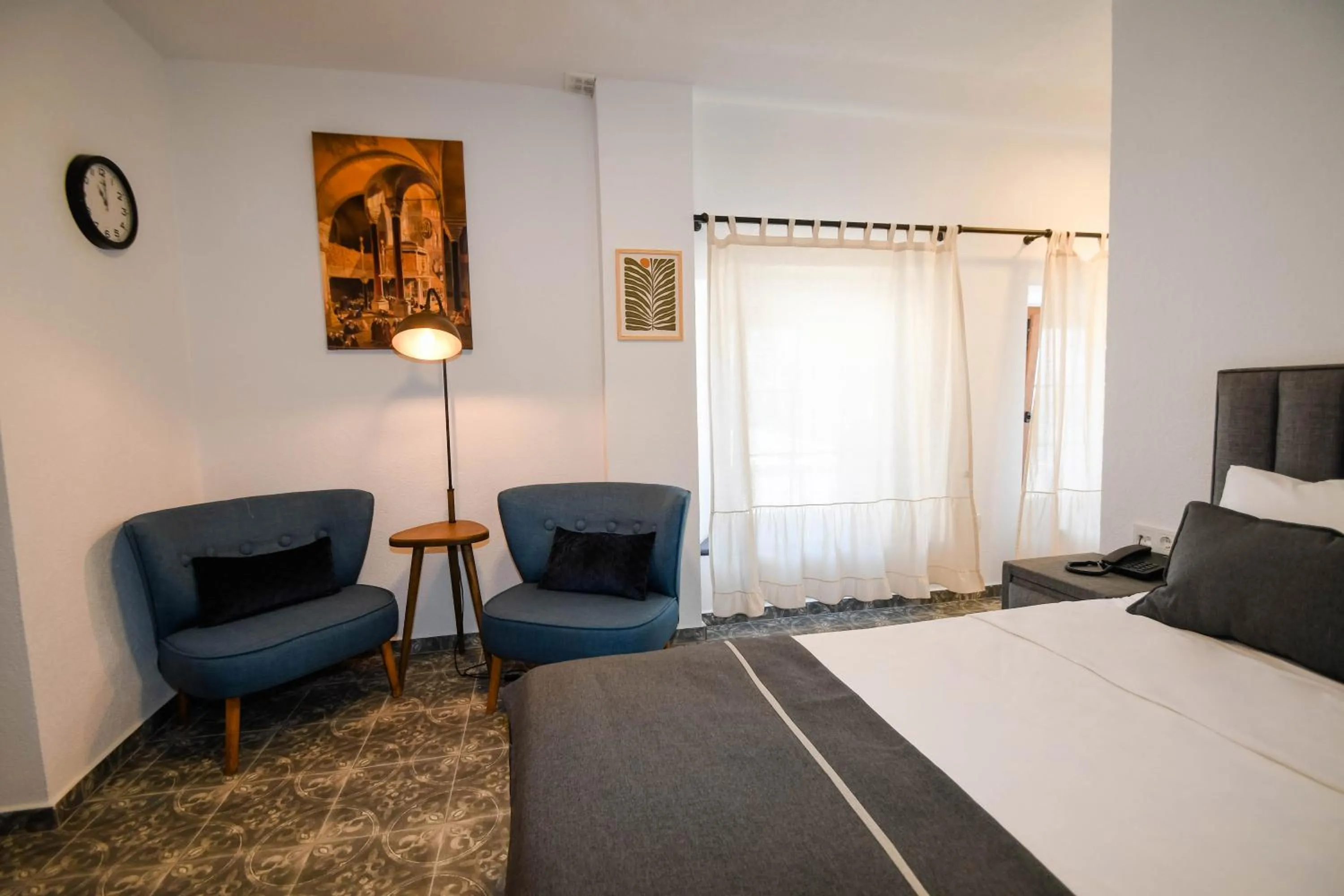 Bed in Swan Boutique Hotel