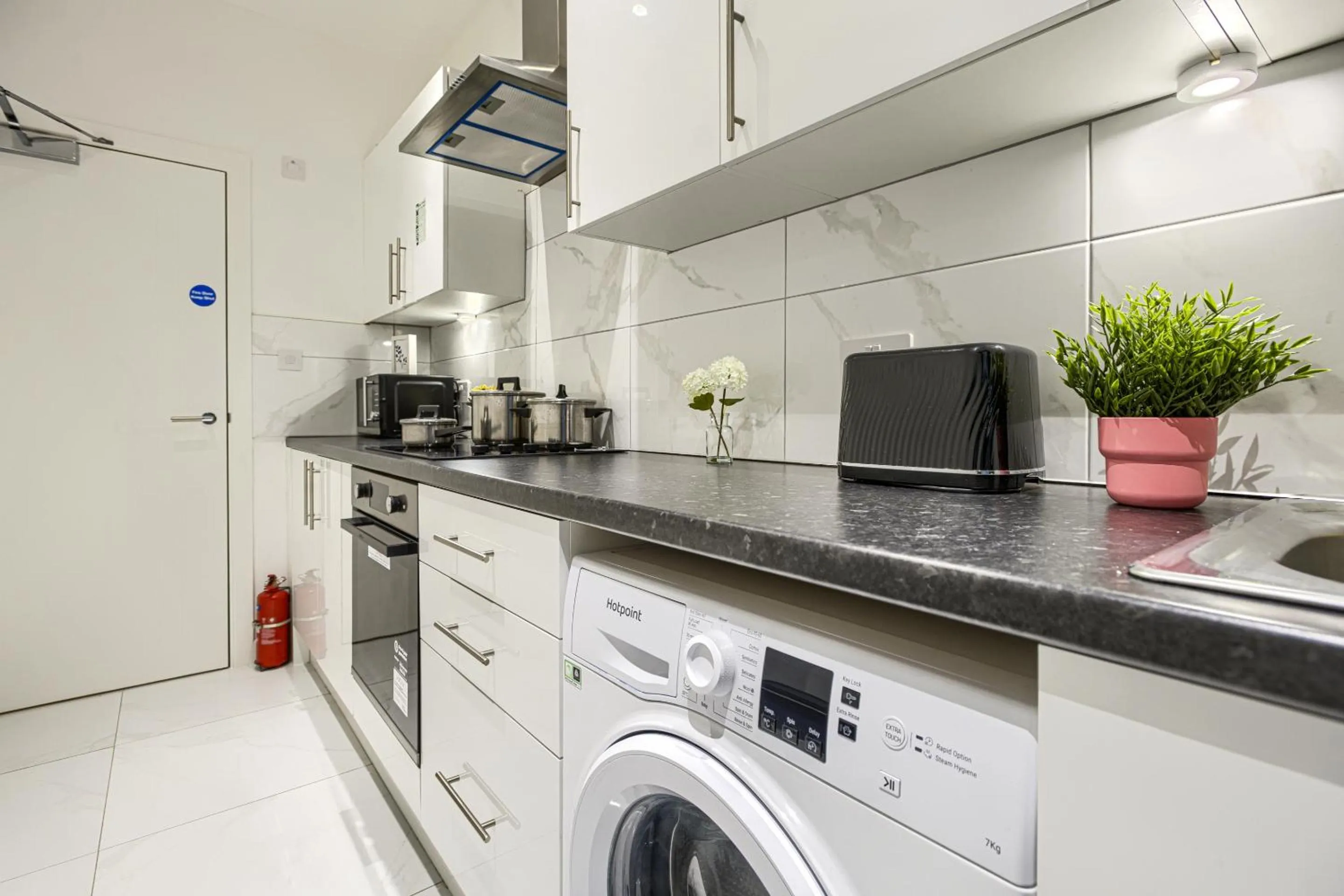 Kitchen or kitchenette in The Finsbury Deluxe Apartments