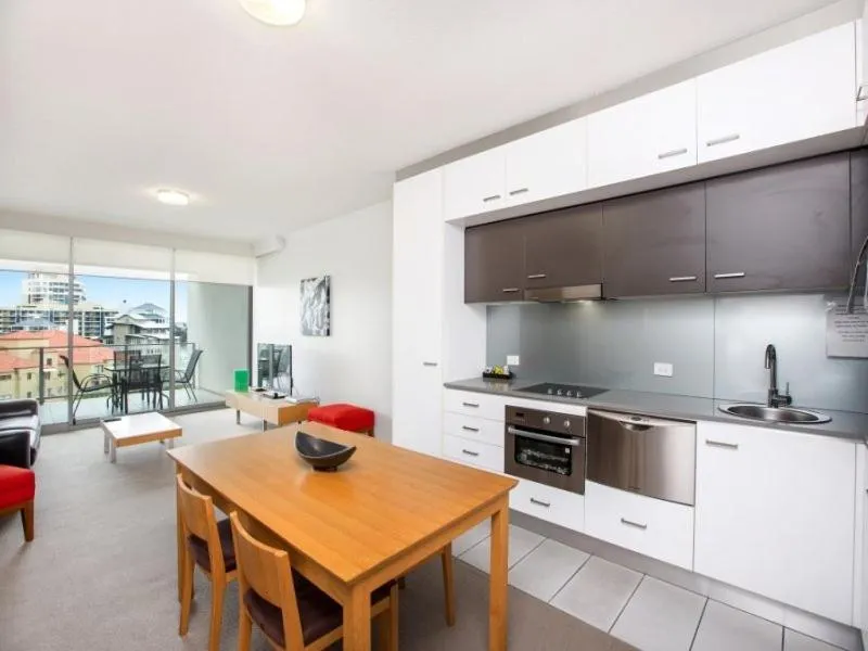Kitchen or kitchenette in Story Apartments