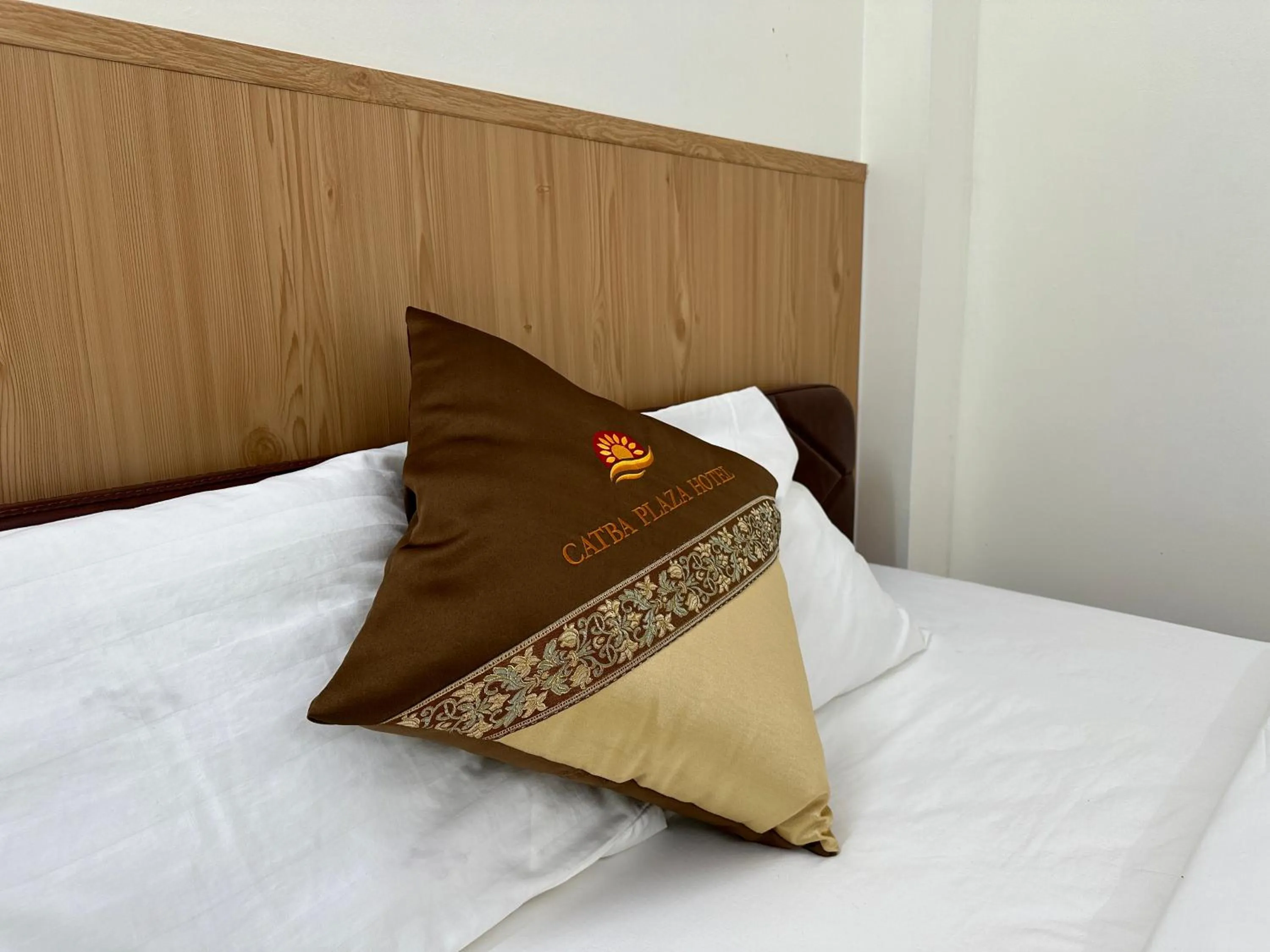 Bed in Cat Ba Plaza Hotel