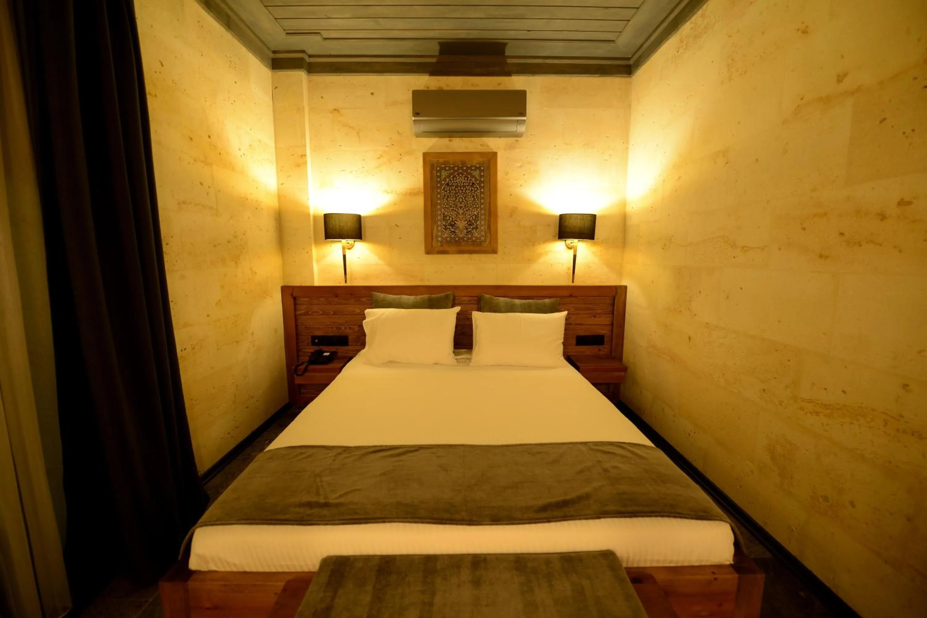 Bed in Perla Cappadocia