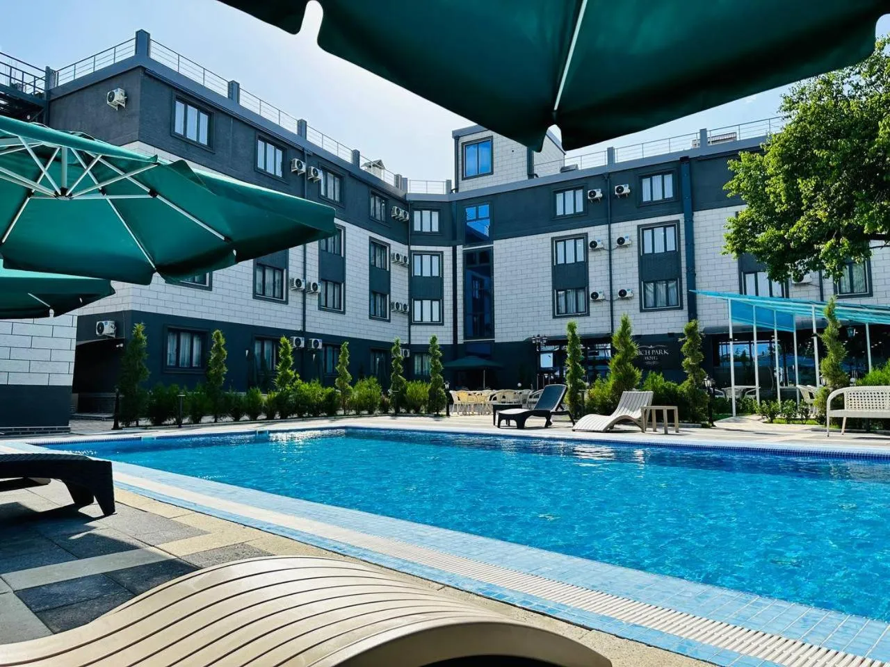 Swimming pool in RICH PARK HOTEL