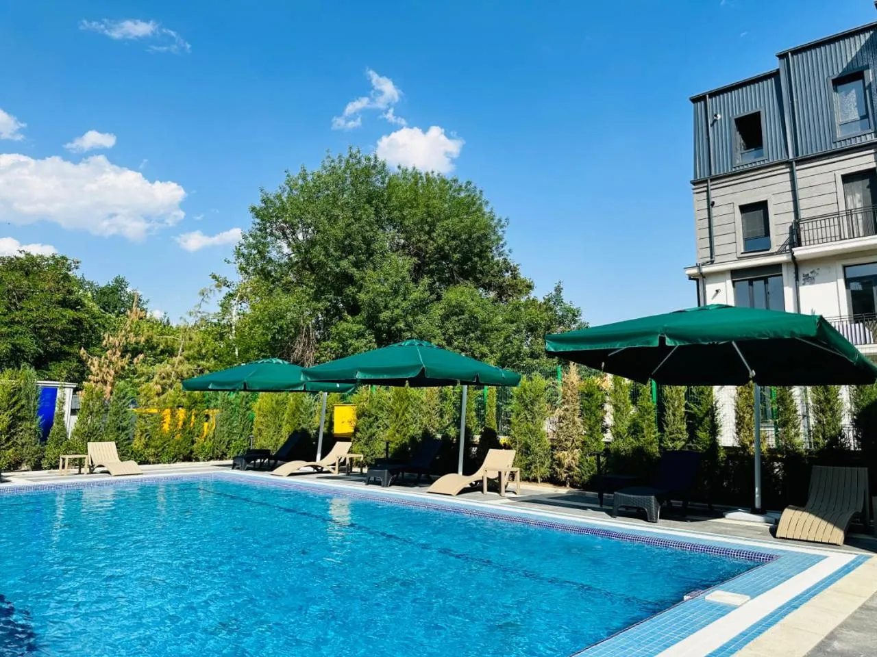 Swimming pool in RICH PARK HOTEL
