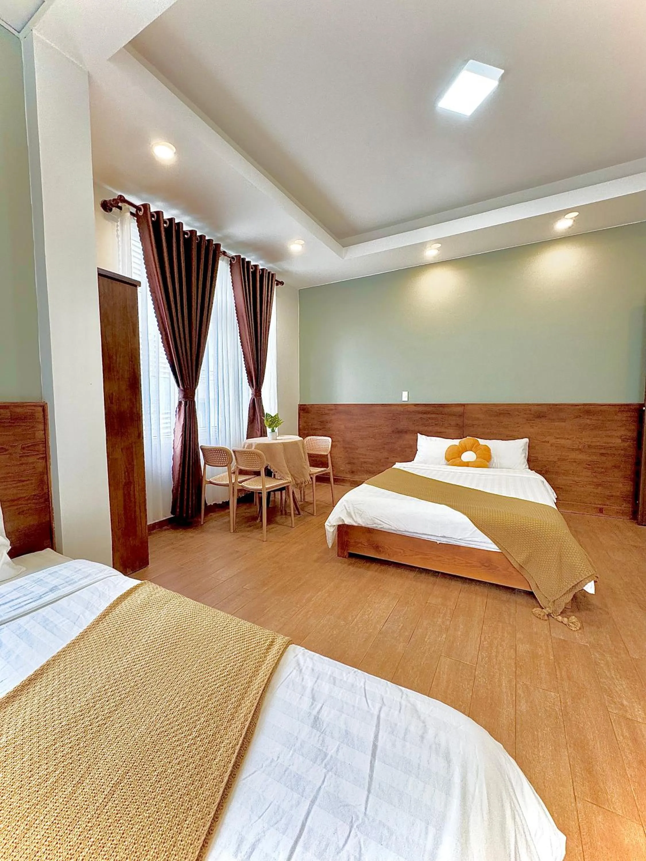 Seating area, Bed in Quang Minh Dalat Hotel