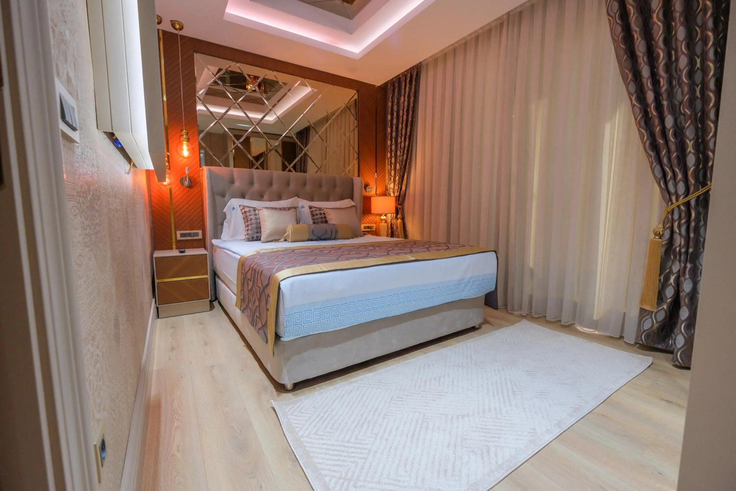 Bed in Elysium Deluxe Suites Antalya