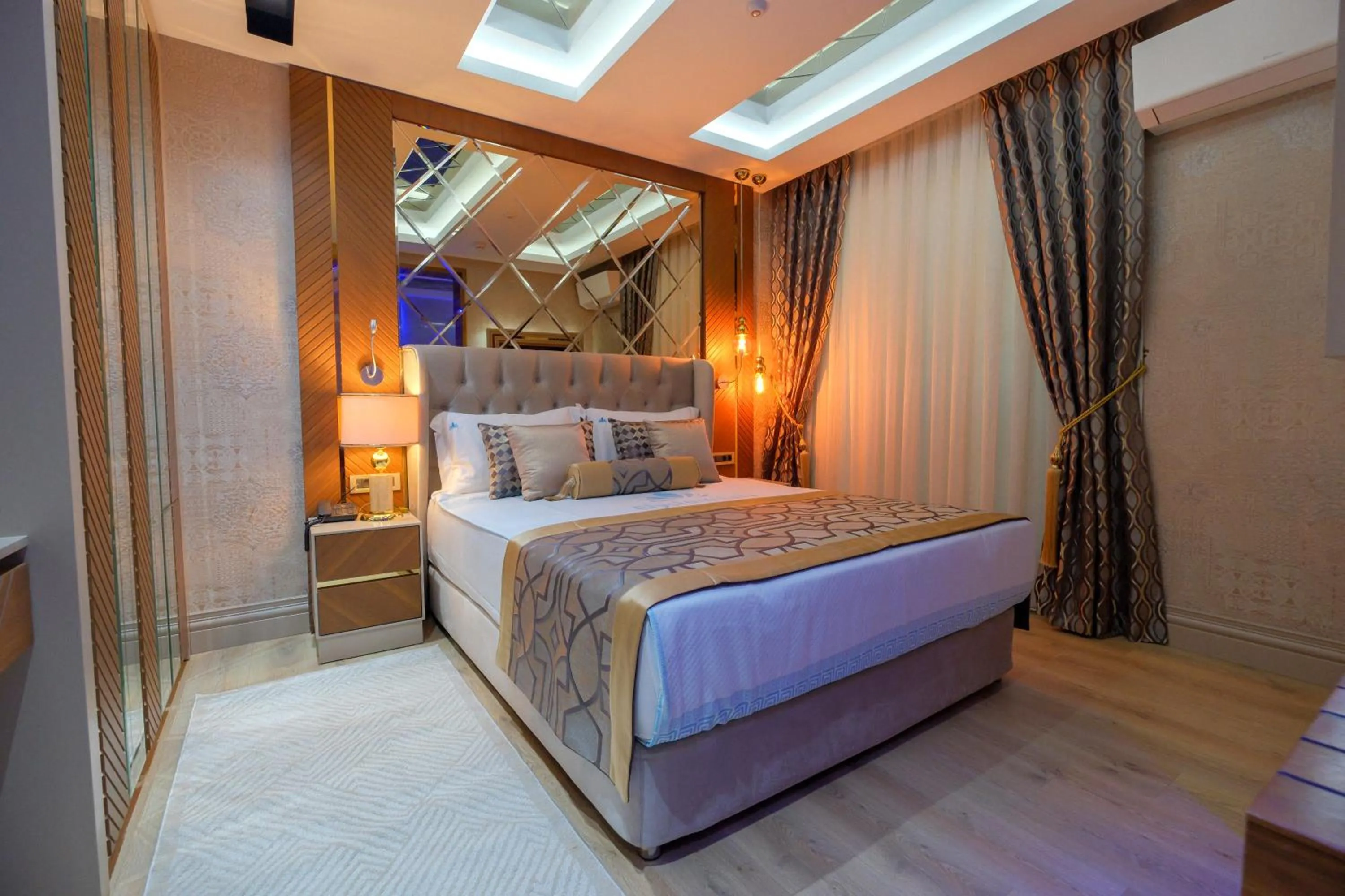 Bed in Elysium Deluxe Suites Antalya