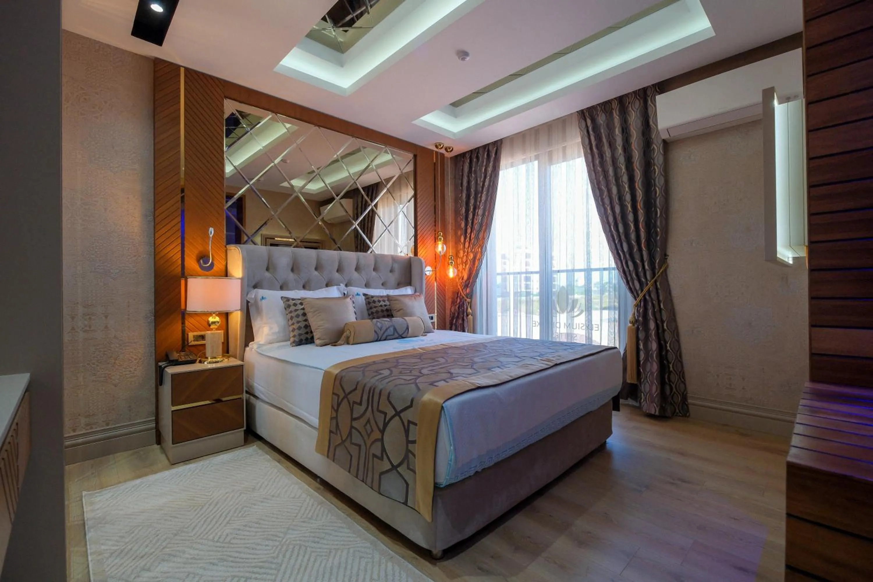 Bed in Elysium Deluxe Suites Antalya