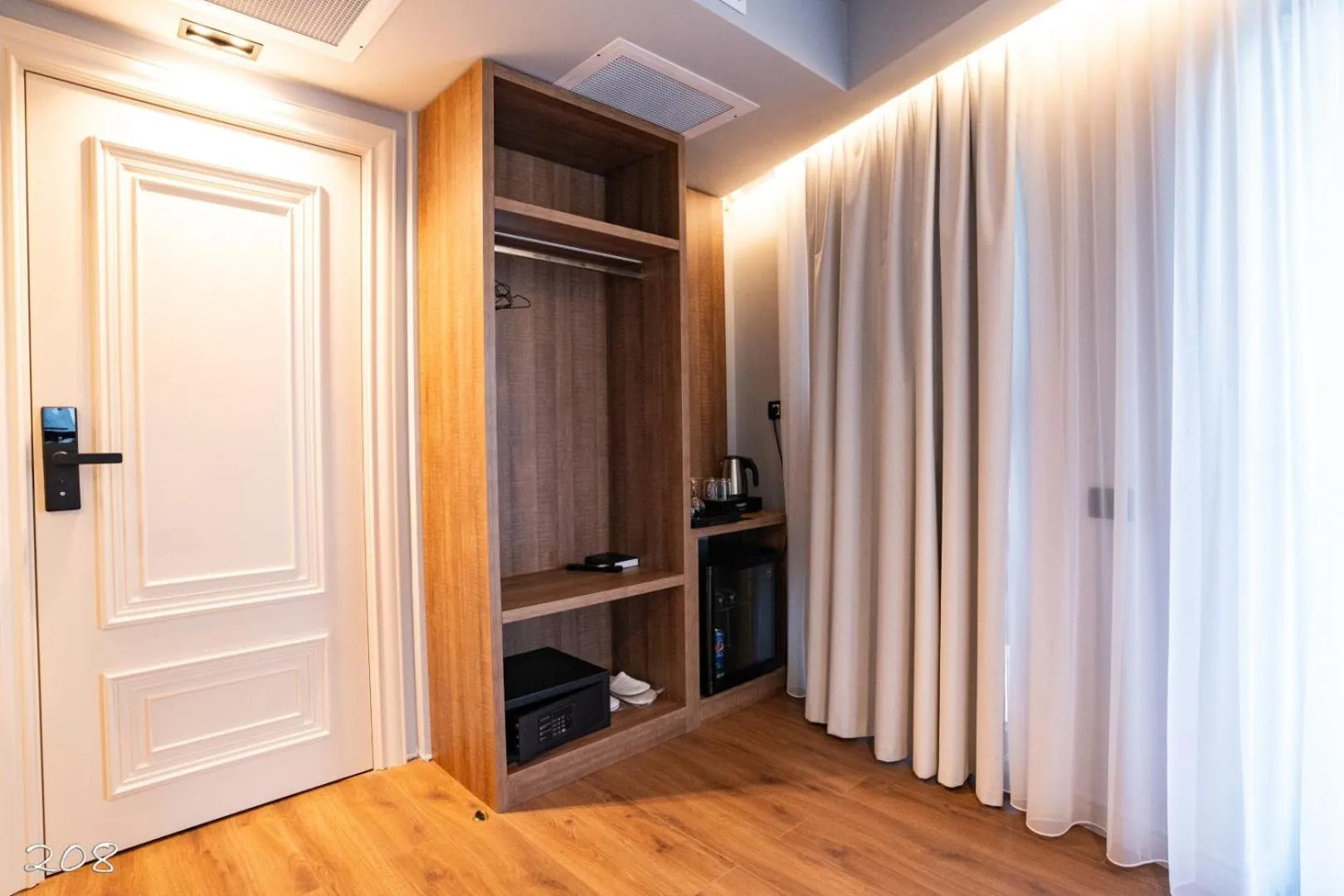 wardrobe in Cosmopolita Boutique Hotel