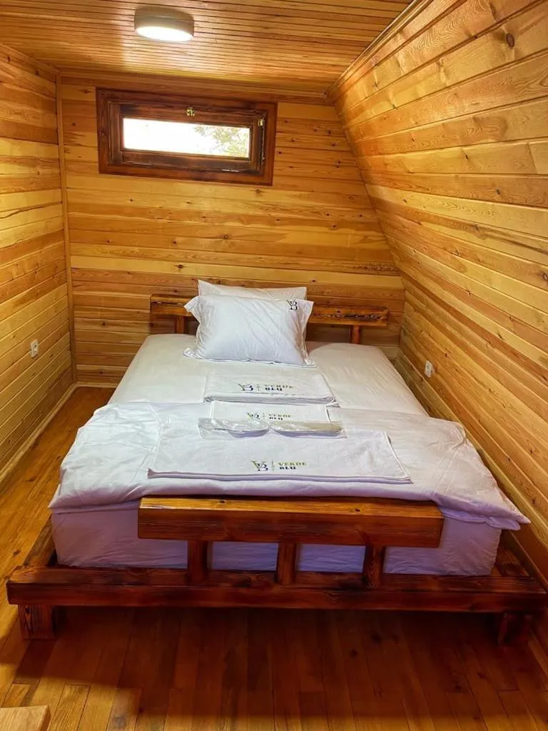 Bed in Verde Blu Bungalow