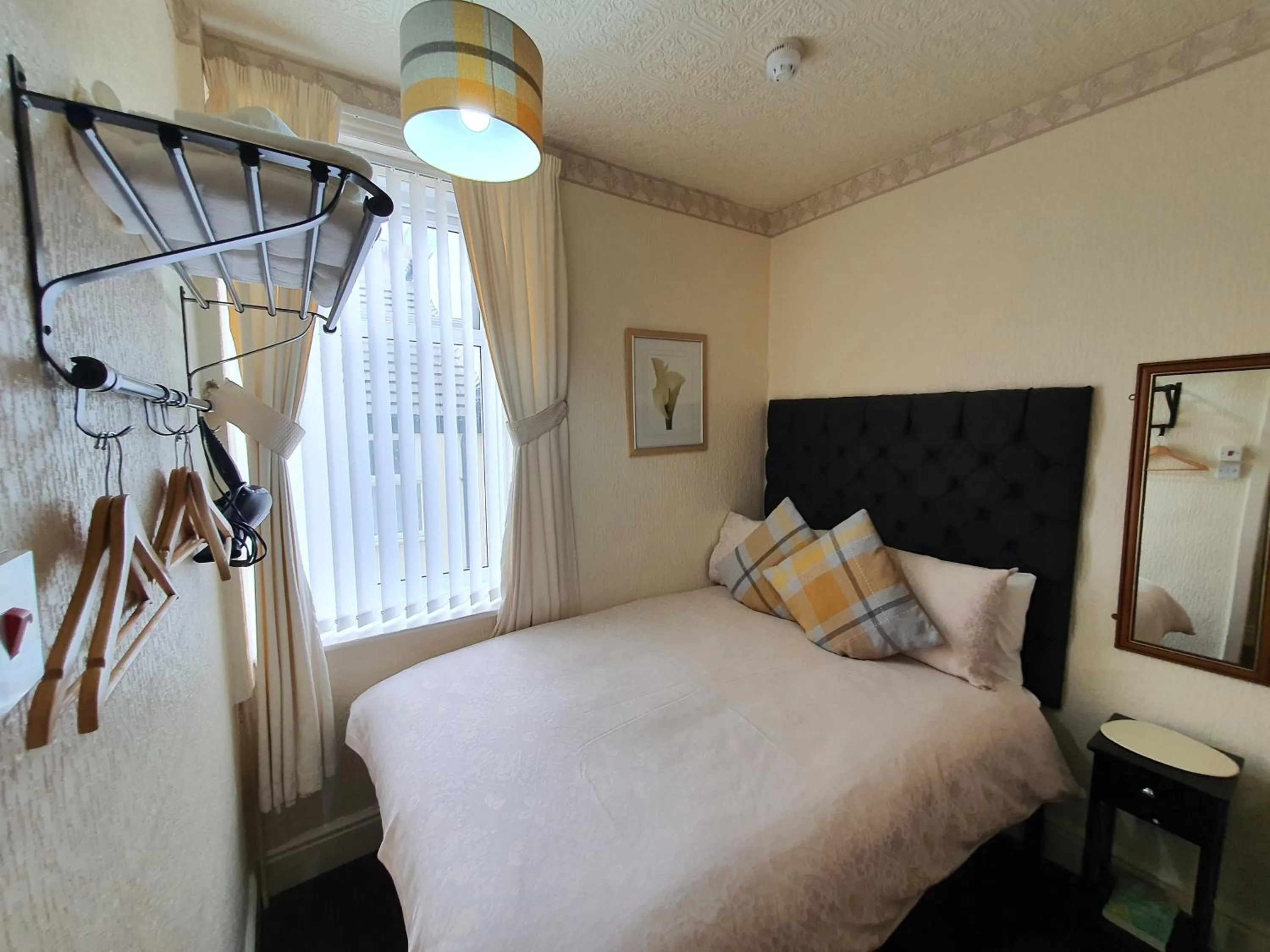 Bed in Windsor House Hotel