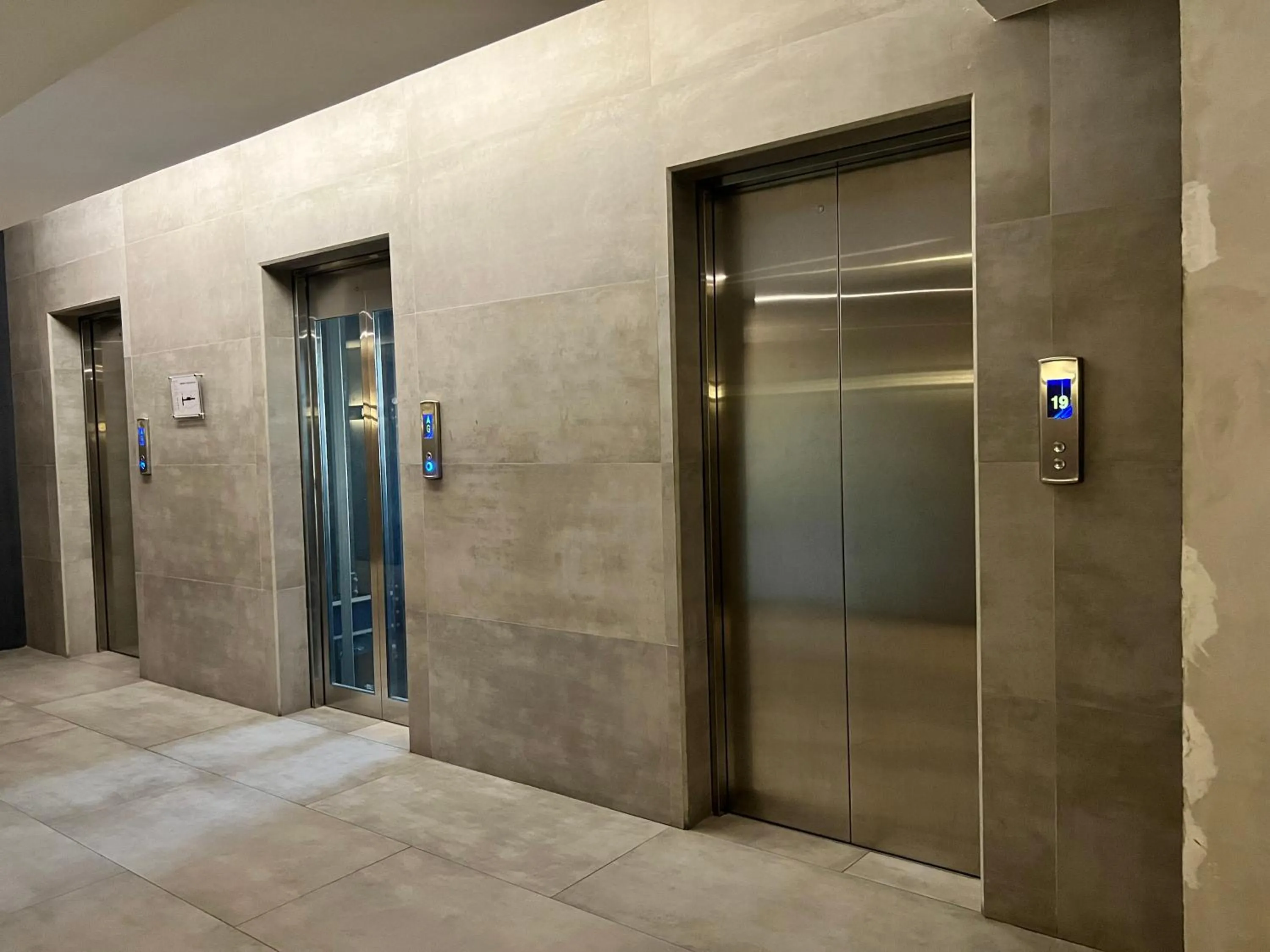 elevator in Cozy Spacious Hotel Type Condo with Smart TV and WiFi