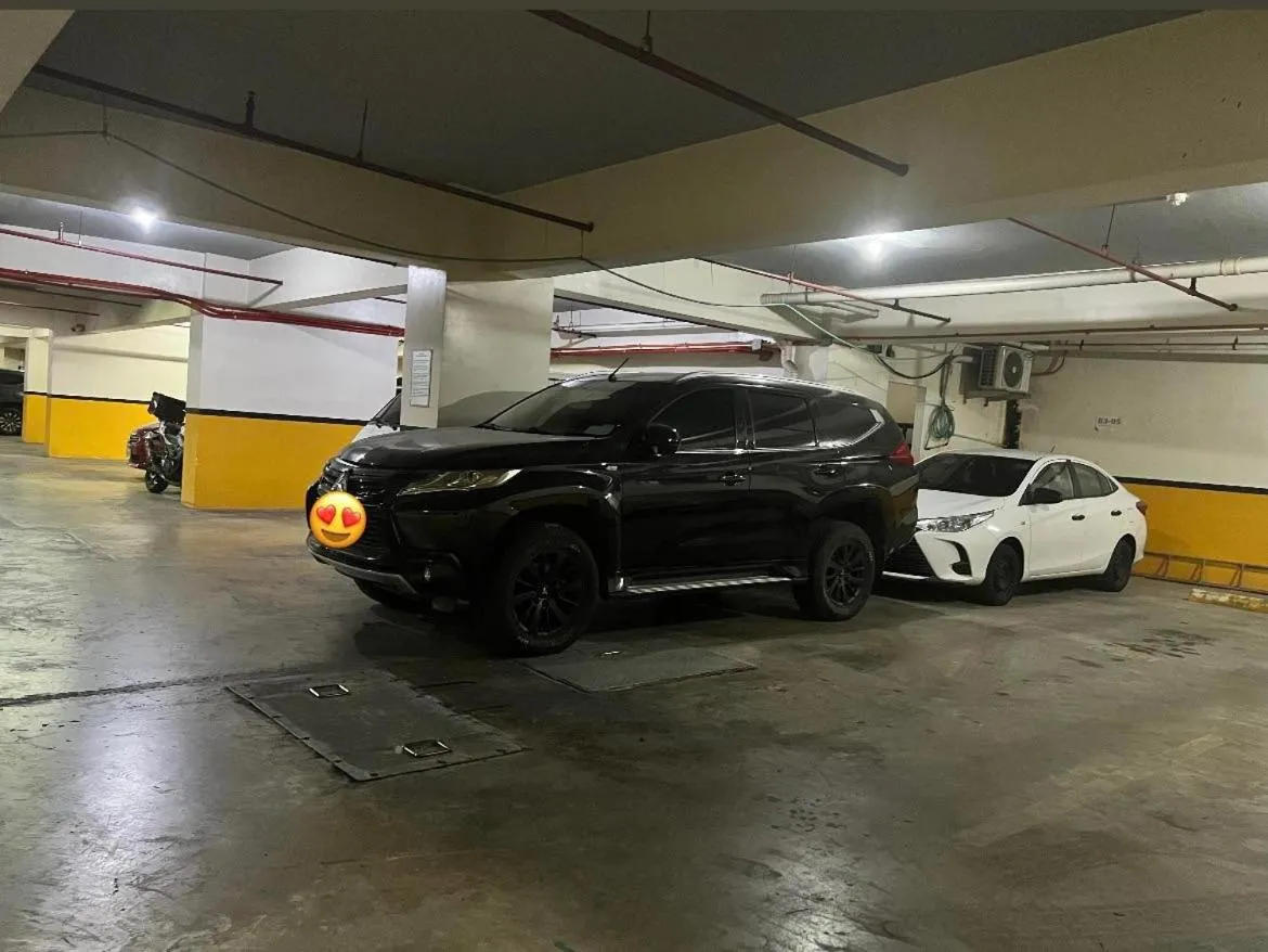 Parking in Cozy Spacious Hotel Type Condo with Smart TV and WiFi