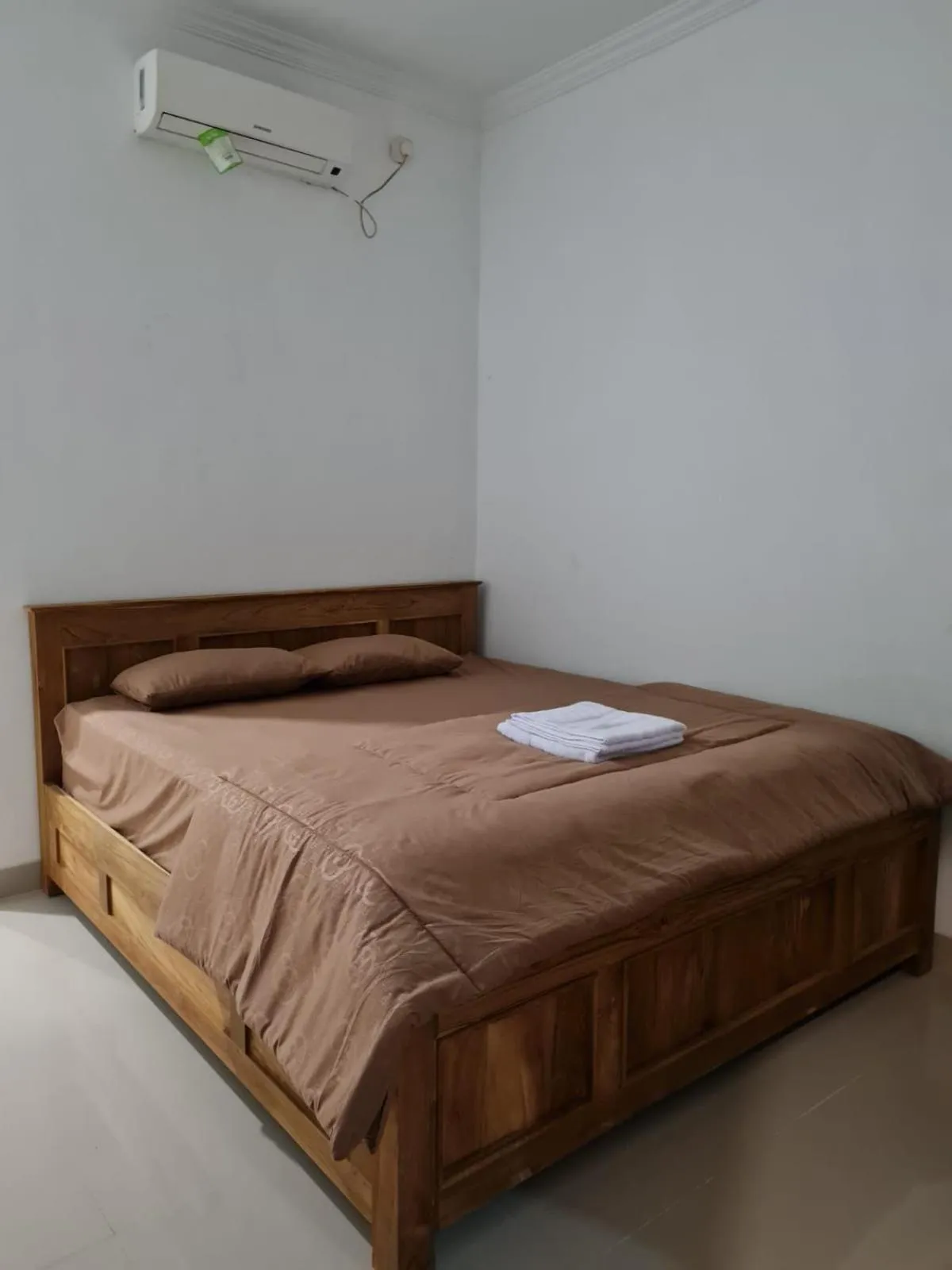 Bed in Nexdeco House Homestay Syariah Solo