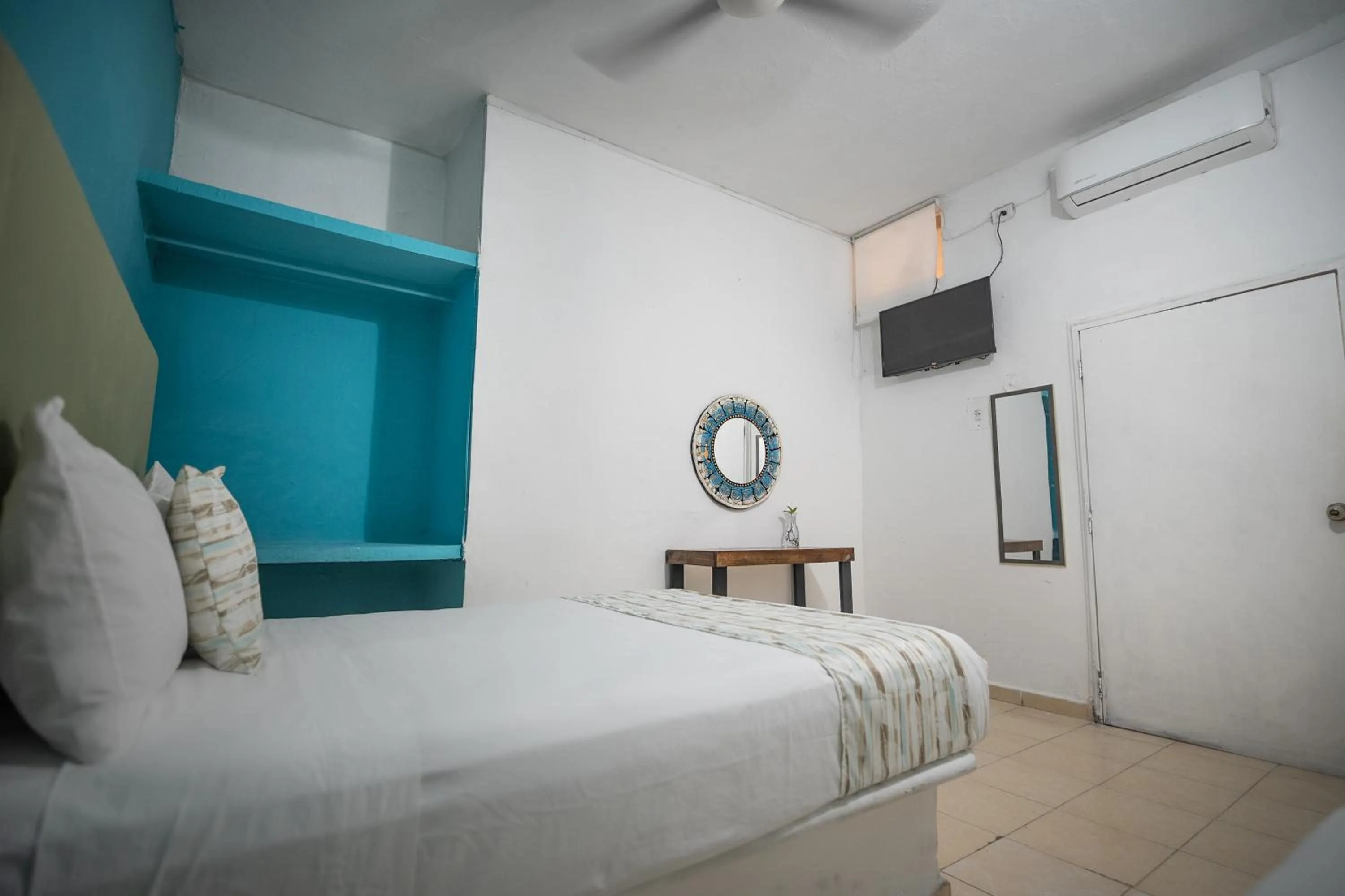 Bed in Hotel Posada Aurora