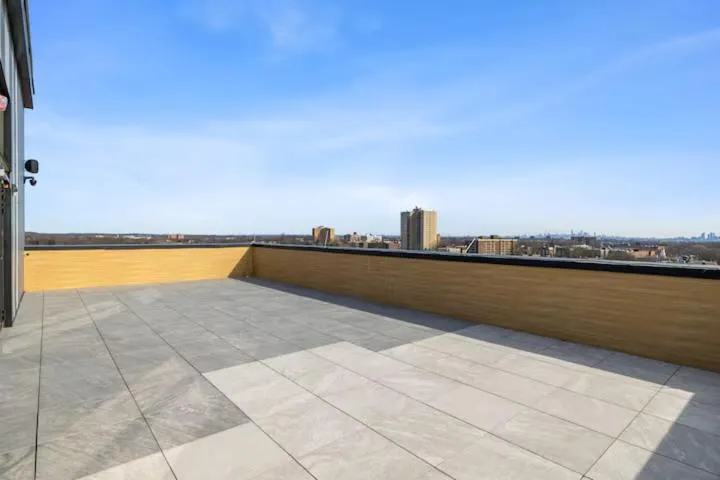 Property building in Emerald Escape, Free Parking, 2 Bath, Sleeps 8 Near American Dream and The Airport, King Bed and 2 Queen Beds, Washer and Dryer