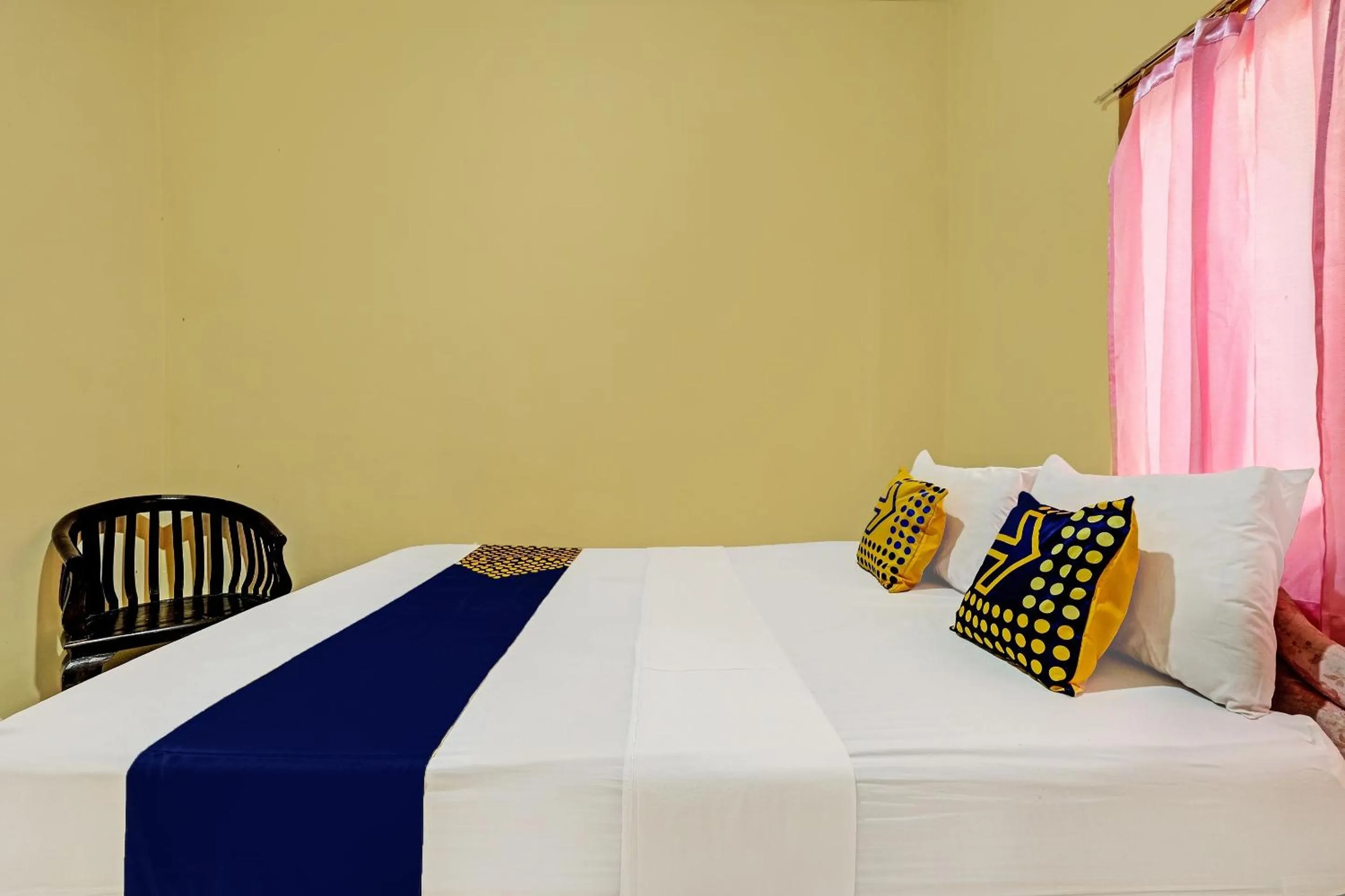 Bedroom in SPOT ON 92408 Hotel Renata 2