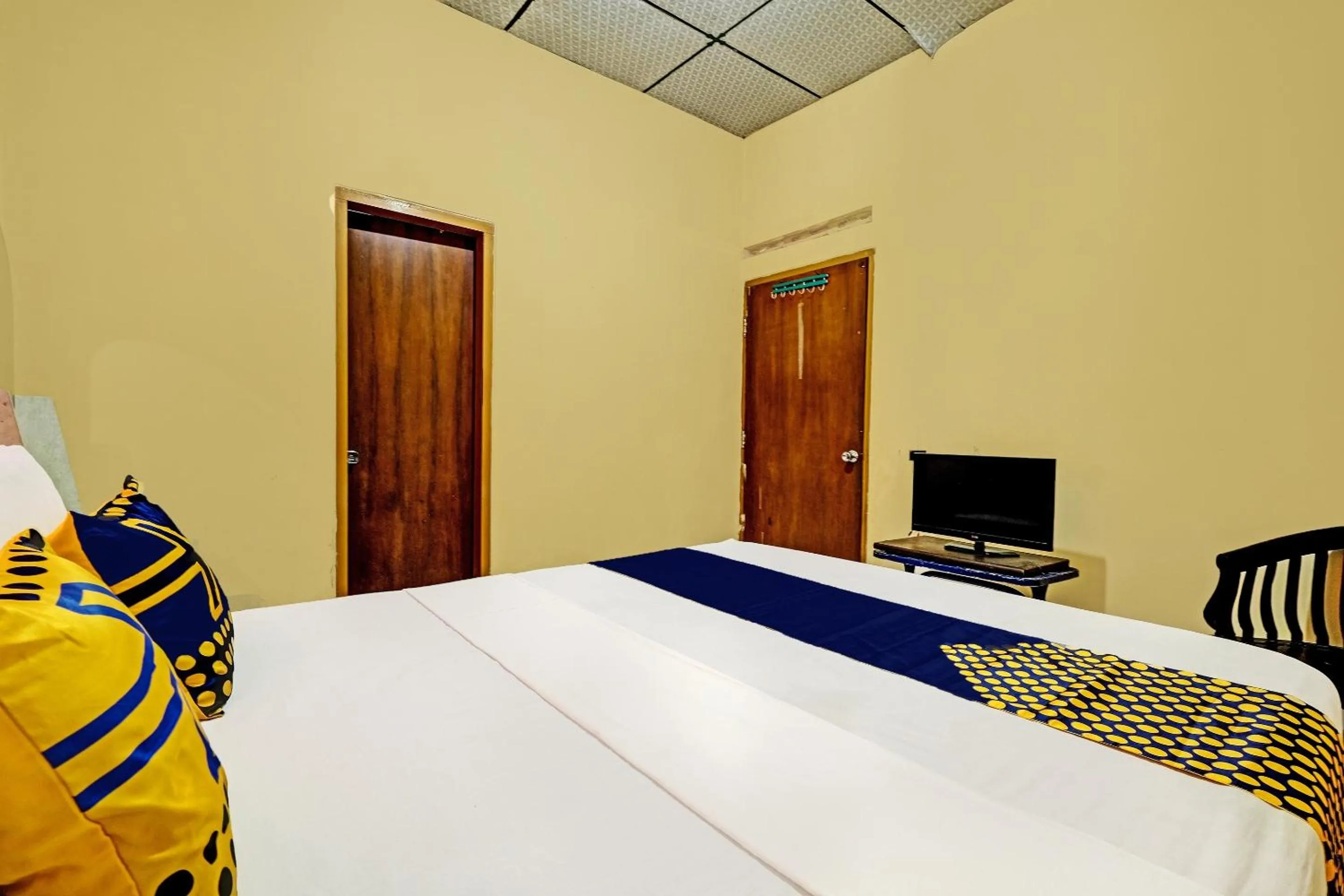 Bedroom in SPOT ON 92408 Hotel Renata 2