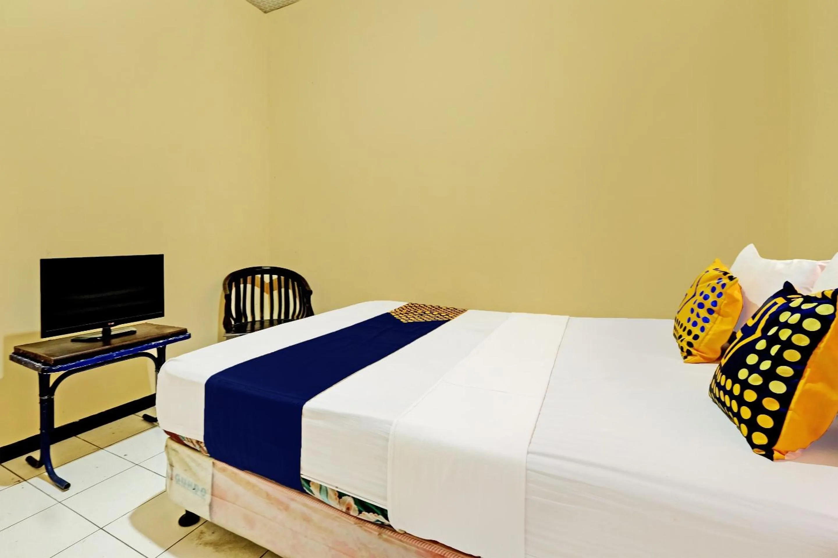 Bedroom in SPOT ON 92408 Hotel Renata 2