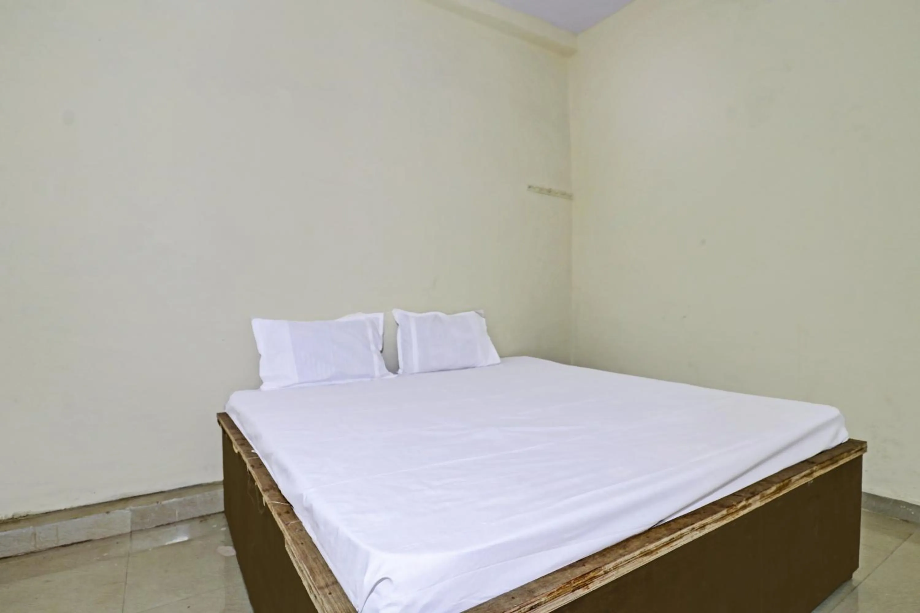 Bedroom in SPOT ON 81062 Moonlight Hotel