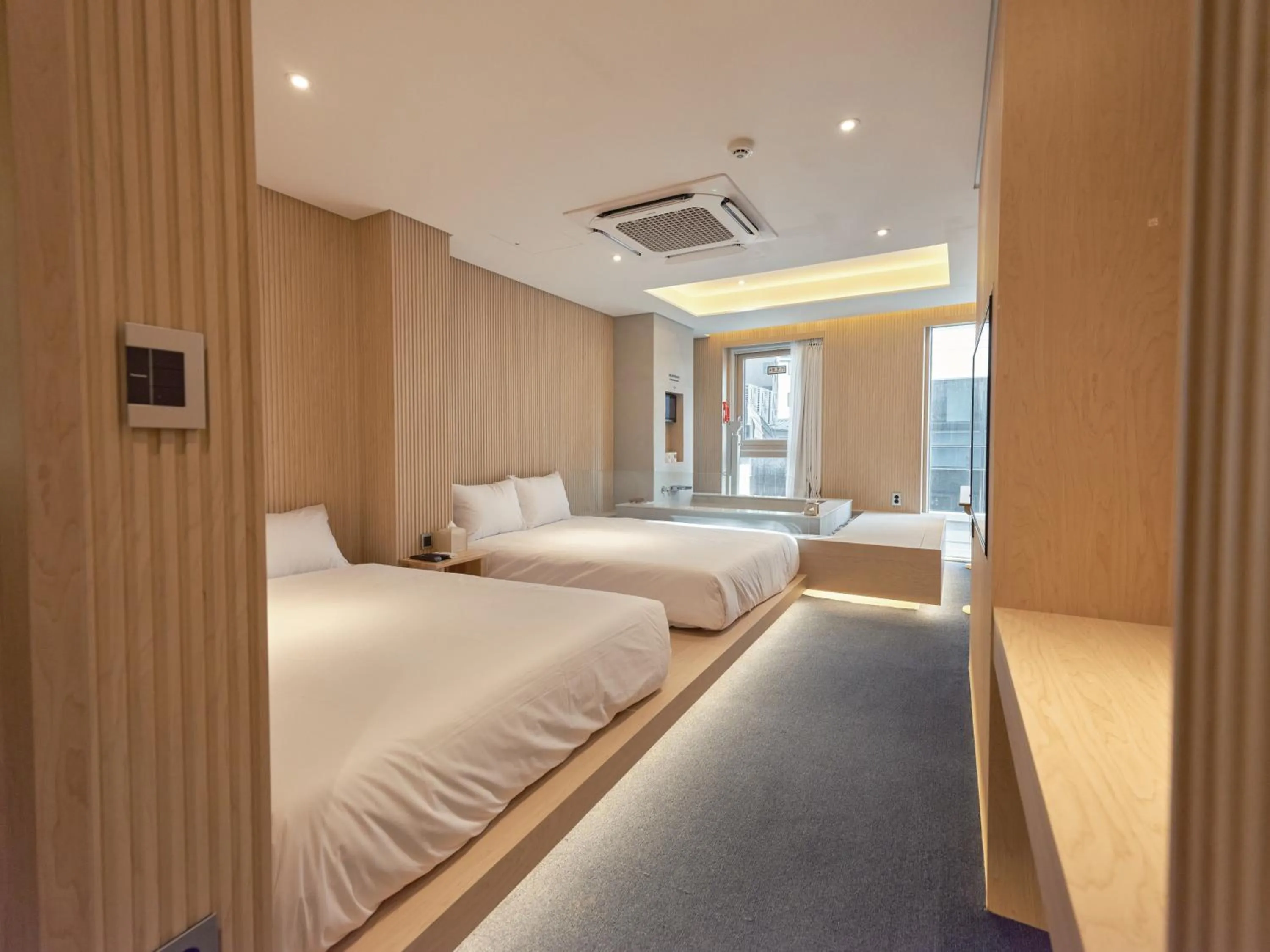 Bedroom, Bed in UH Suite Seoul Square