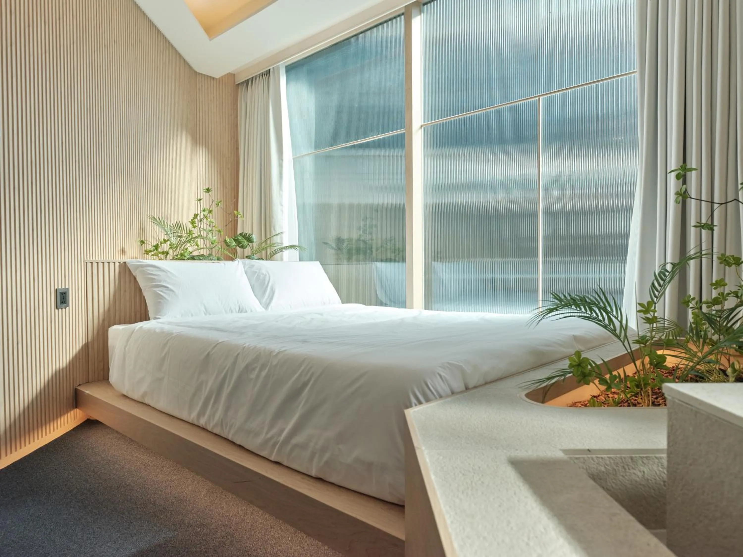 Bed in UH Suite Seoul Square