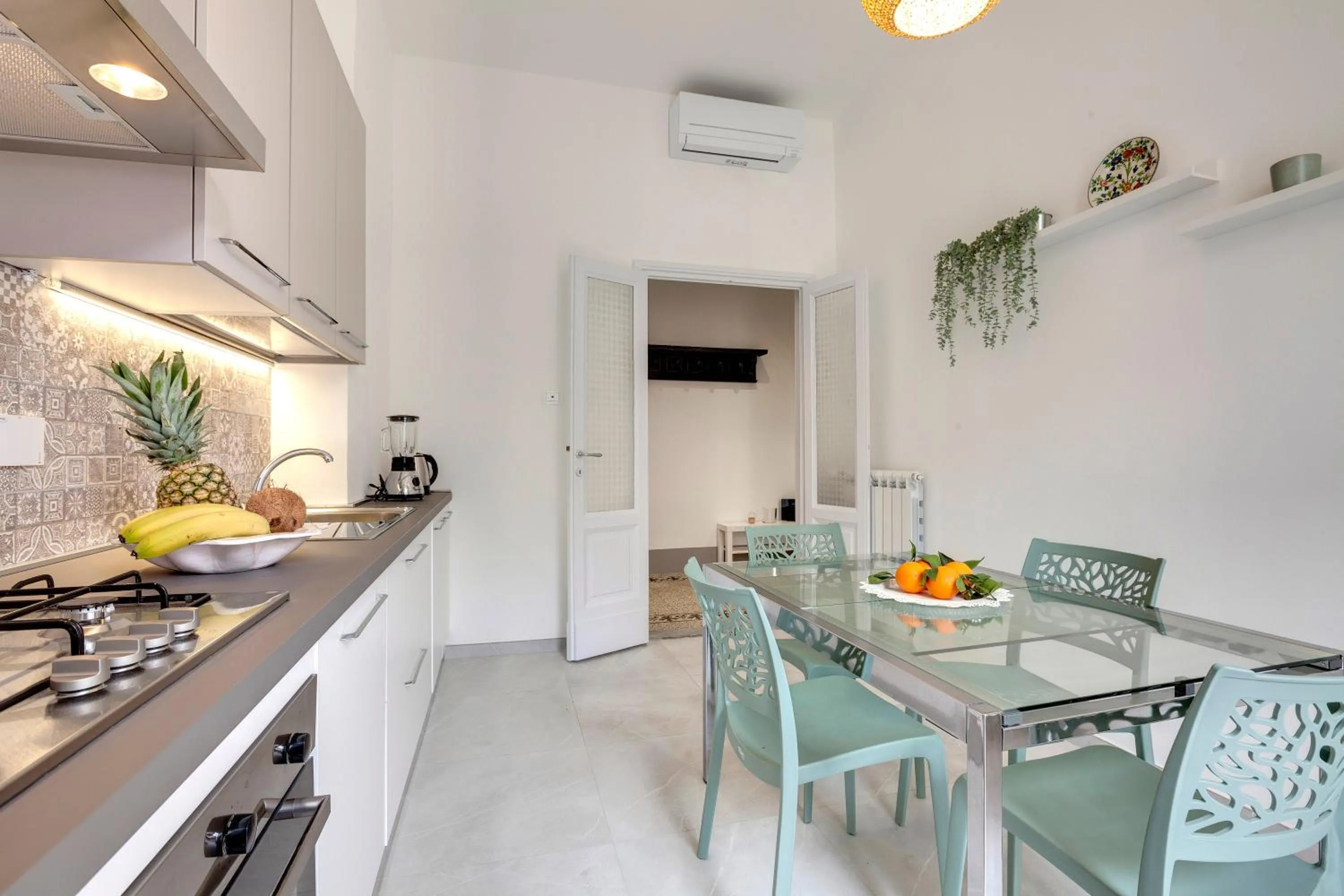Kitchen or kitchenette in Magenta Apartment by Mamo Florence